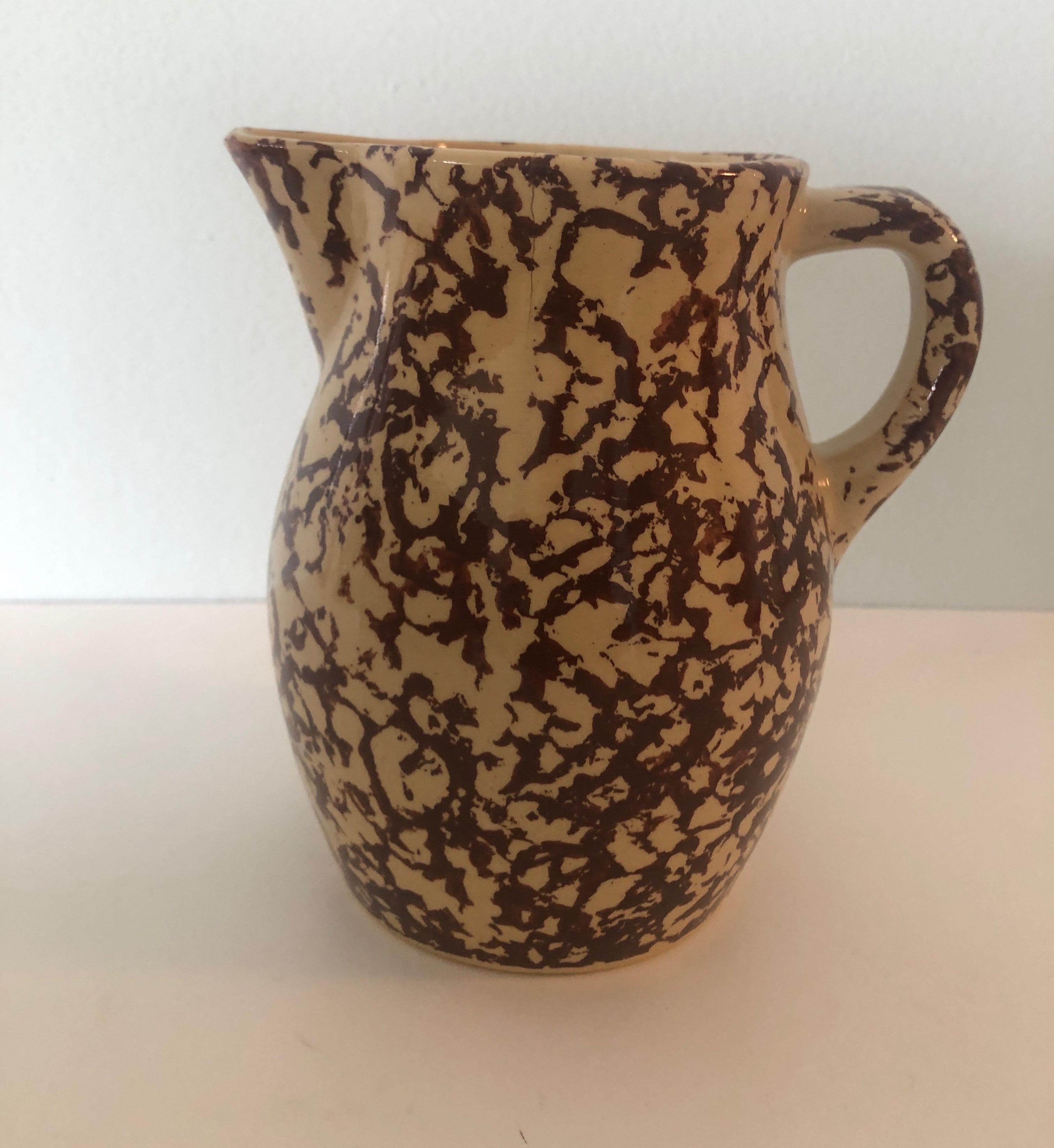 Late 19th century brown spongeware small pitcher.
Please see images for small hairline crack.
Ideal for display or flowers.
Size: 4.5
