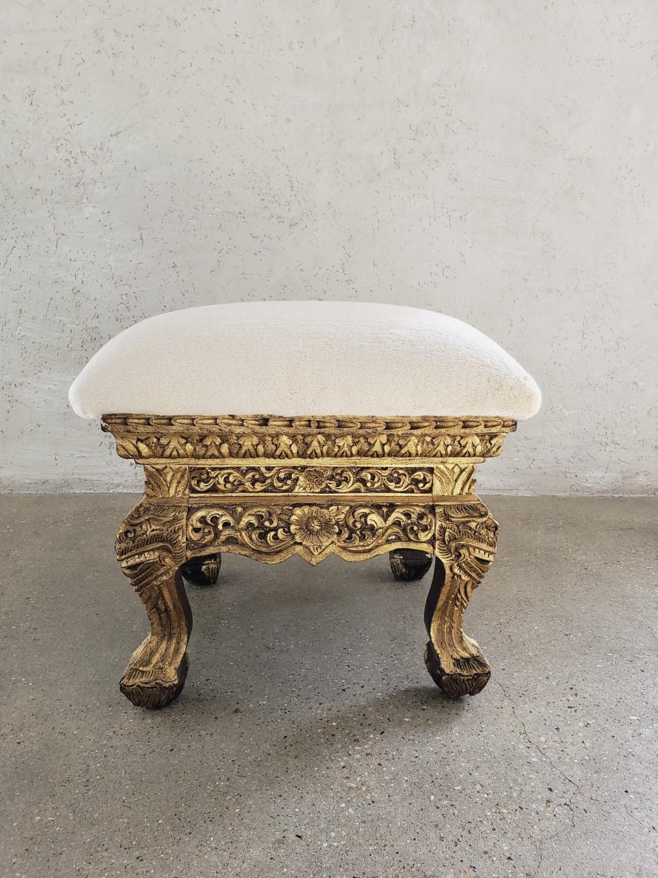 Originally used as a stand for incense, this gilt-wood Burmese stand has been re-imagined as a footstool/ottoman which is great for sitting, or using as a side table by incorporating a tray. Gorgeous carvings and patina make it a show stopper.

