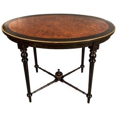 Late 19th Century Burr Walnut and Ebonized Oval Centre Table with Brass Mounts