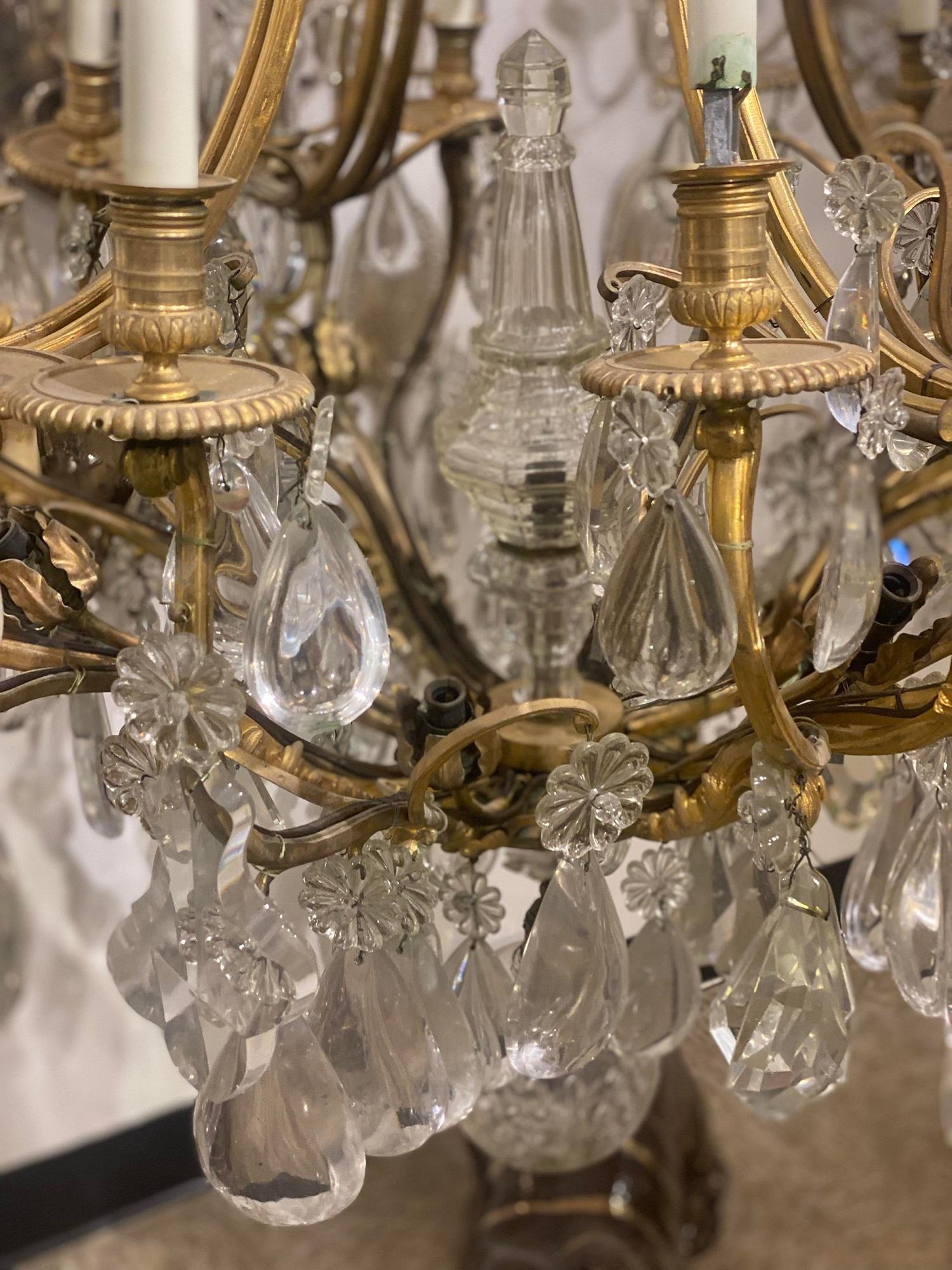 A late 19th century gilt bronze Caldwell chandelier with 30 lights picked up from Aspen.CO from Marshall field state 