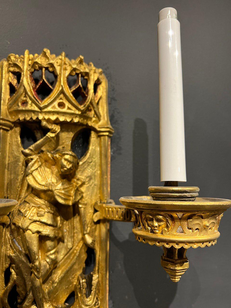 Gilt Late 19th century Caldwell Gothic St. Michael Motif Sconces For Sale