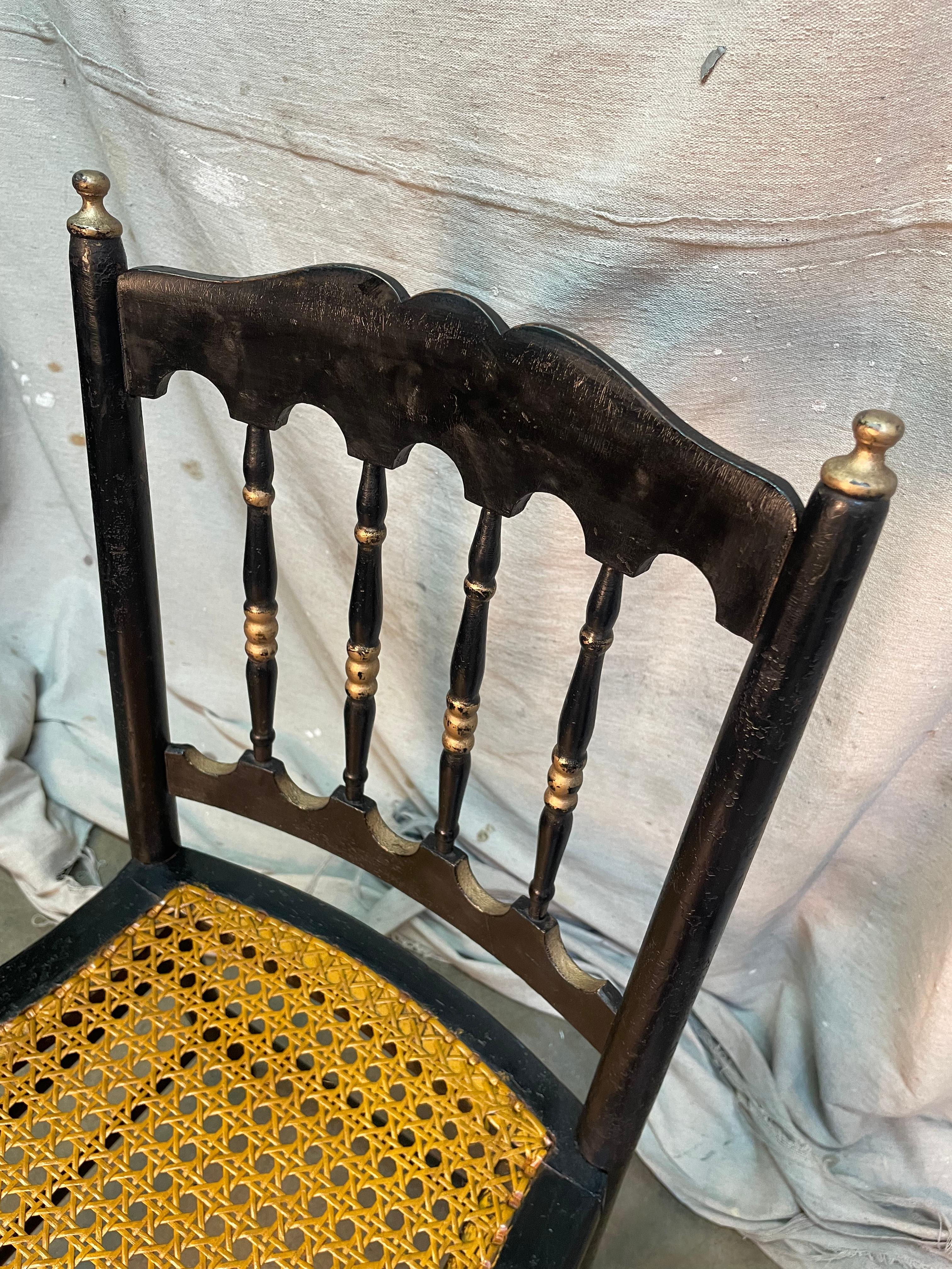 Stunning French late 19th century caned chairs; all caning was done by hand and has stayed unbelievably strong for years. Antique French Country hand caned seat, walnut chair. Has a banister back armchair having scalloped crest and bottom rails,