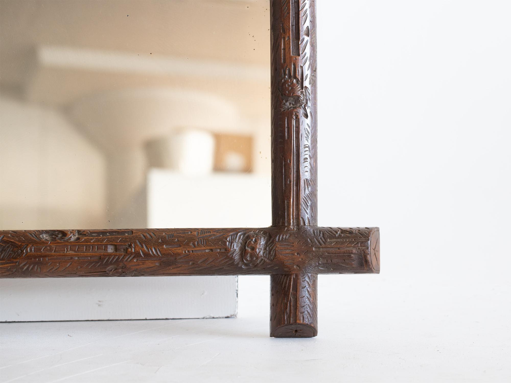 Wood Late 19th Century Carved Black Forest Mirror For Sale
