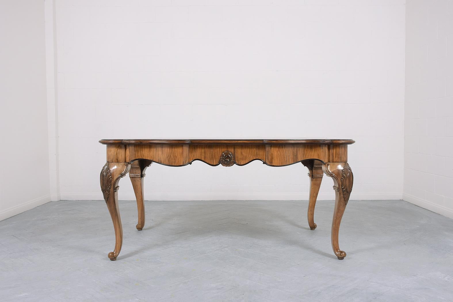 Dive into the charm of the late 19th century with our English antique dining room table, masterfully hand-crafted from rich walnut wood and veneers. Boasting great condition, our team of expert craftsmen has meticulously restored and refinished this