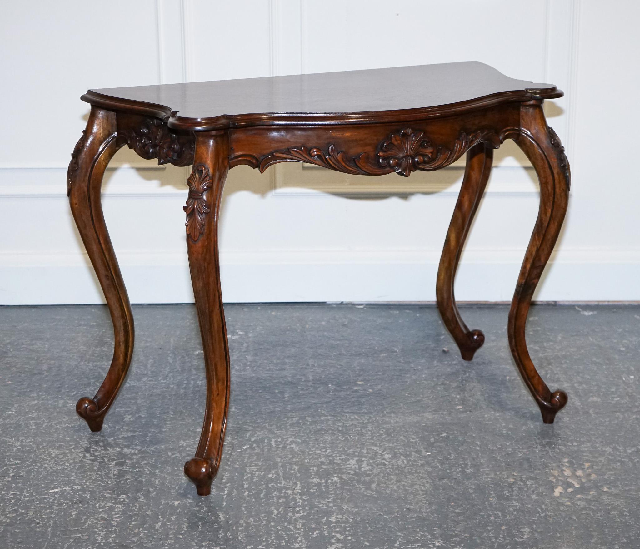 We are delighted to offer for sale this Lovely Late 19th-century French Carved Console Table.

This French-carved console table is a stunning piece of furniture that will add elegance and charm to any room.

The table features a carved apron