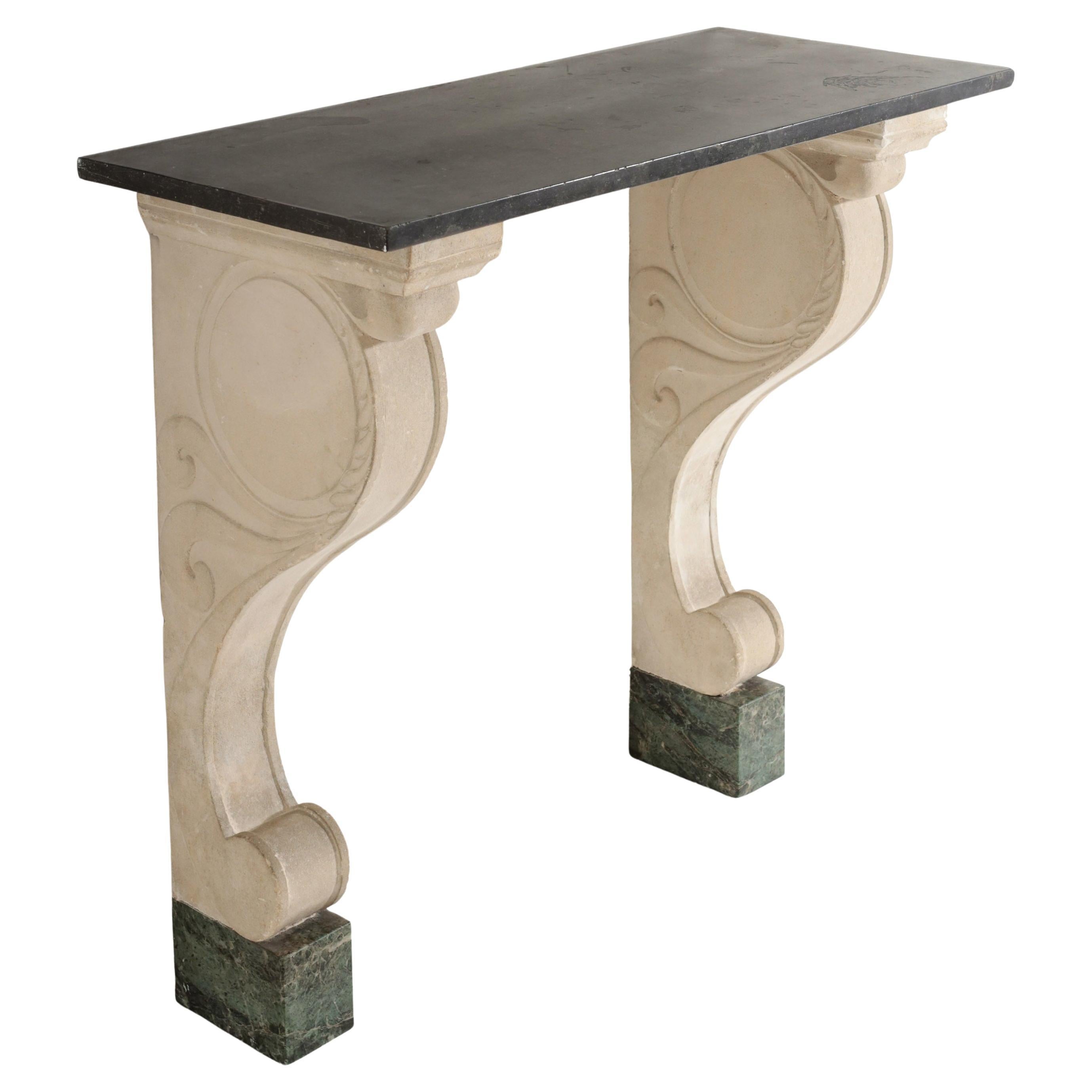 Late 19th Century Carved Limestone and Black Marble Console