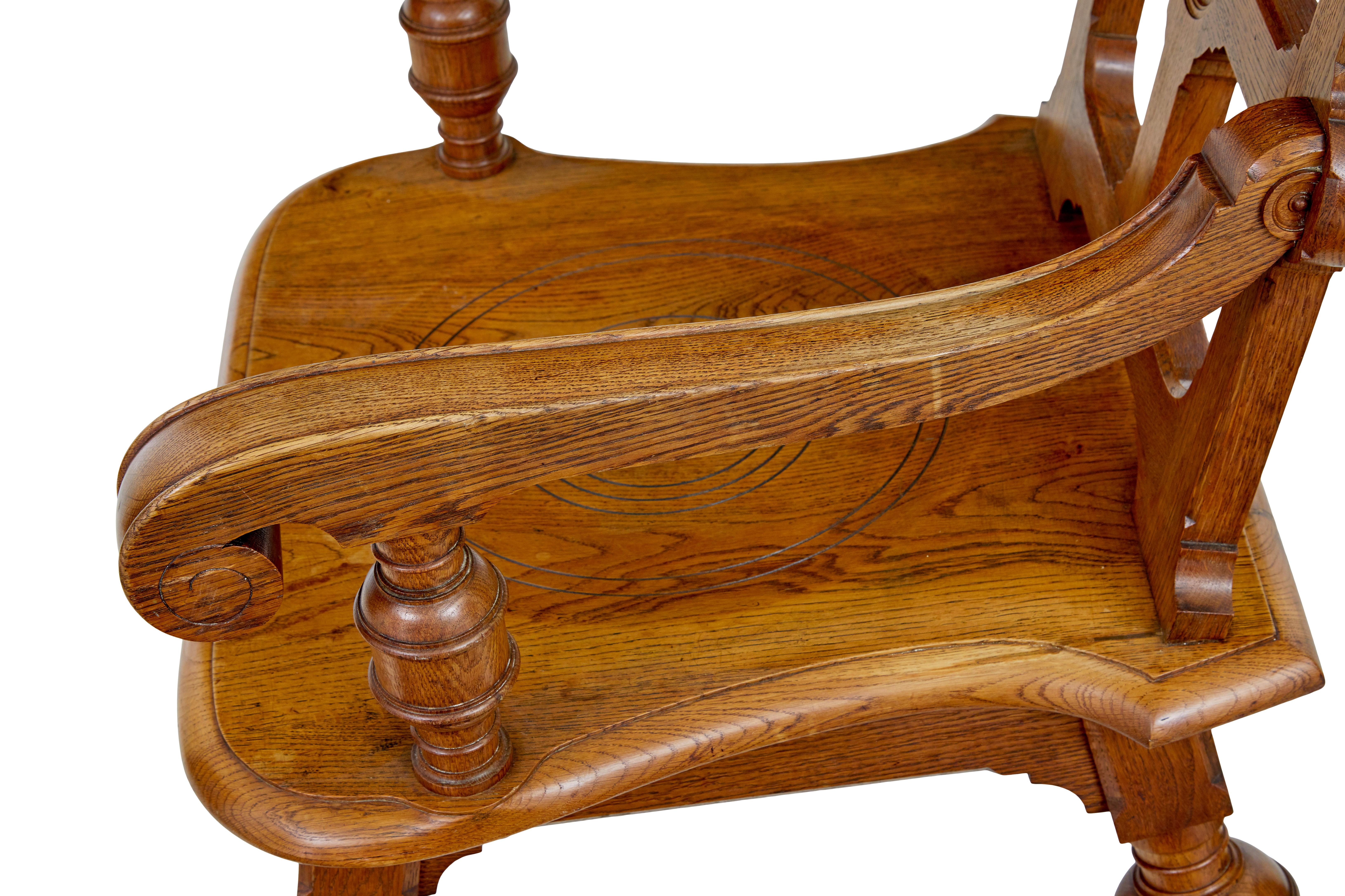 English Late 19th Century carved oak arts and crafts armchair For Sale