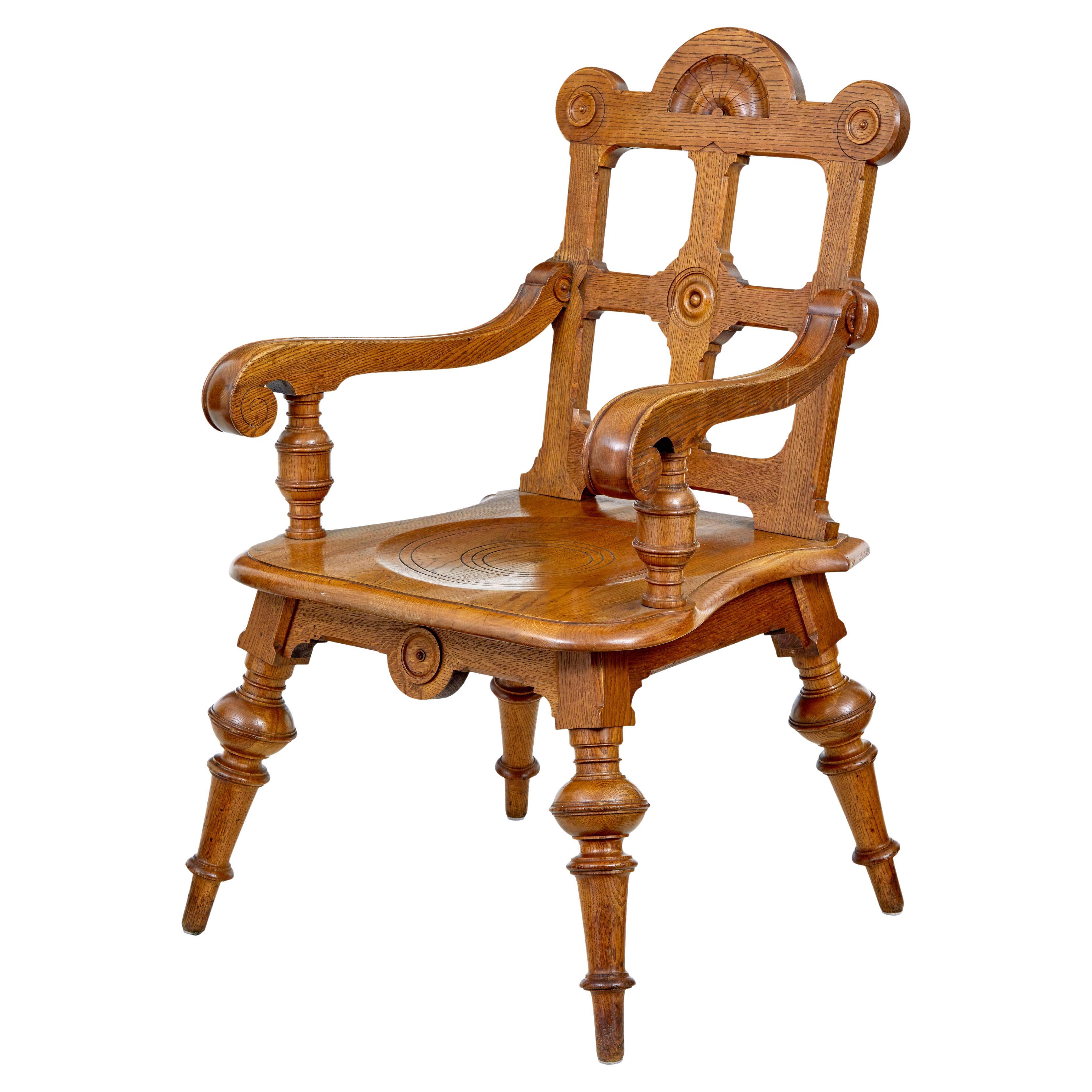 Late 19th century carved oak arts and crafts armchair For Sale