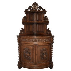 Late-19th Century Carved Oak Bow Front Hunt Corner Cabinet