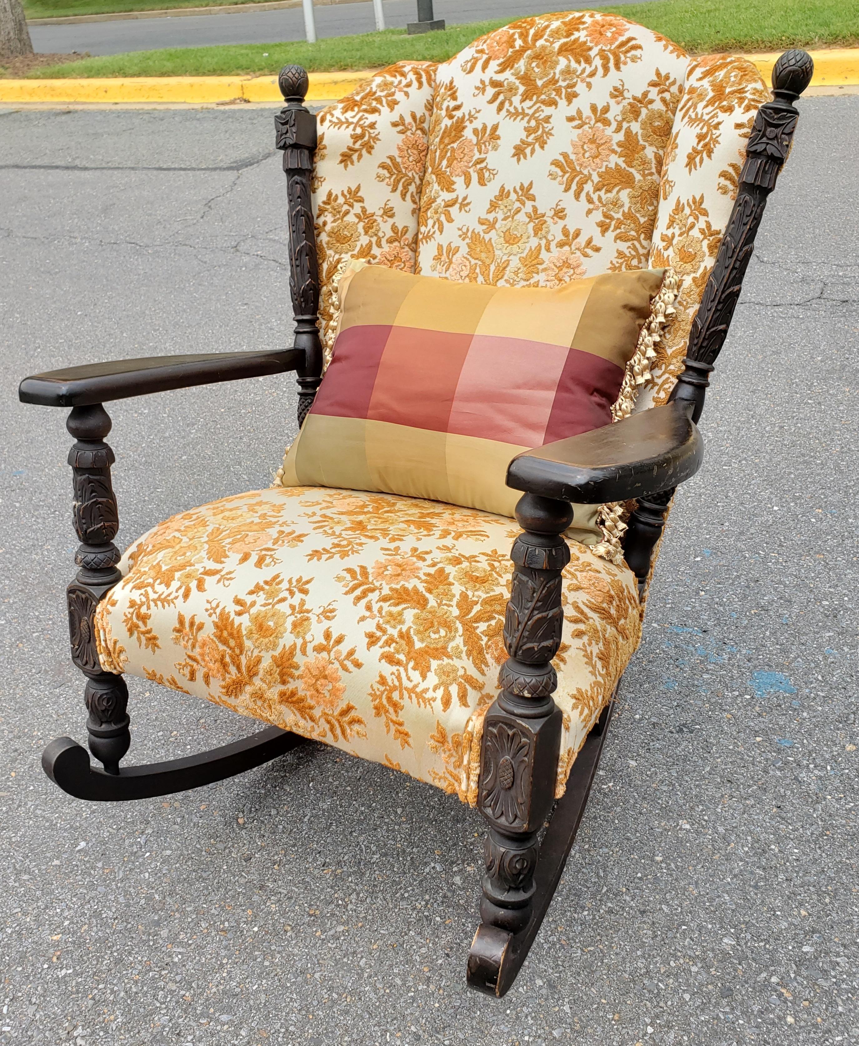 old upholstered rocking chair