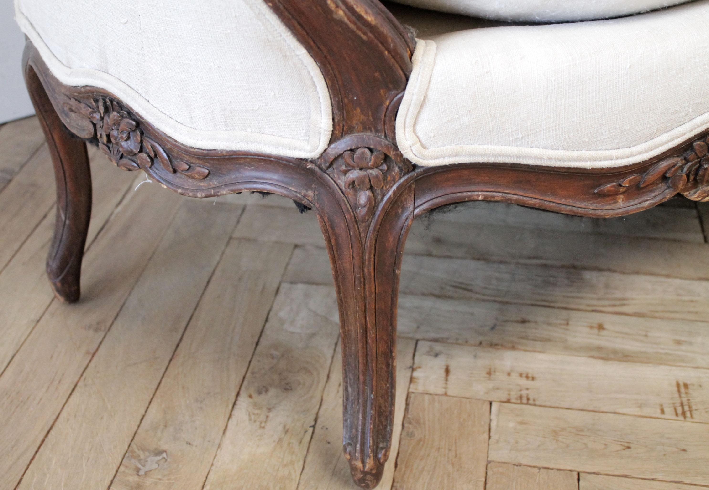 European Late 19th Century Carved Walnut Sofa with Antique French Grainsack Upholstery