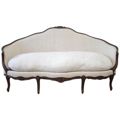 Late 19th Century Carved Walnut Sofa with Antique French Grainsack Upholstery