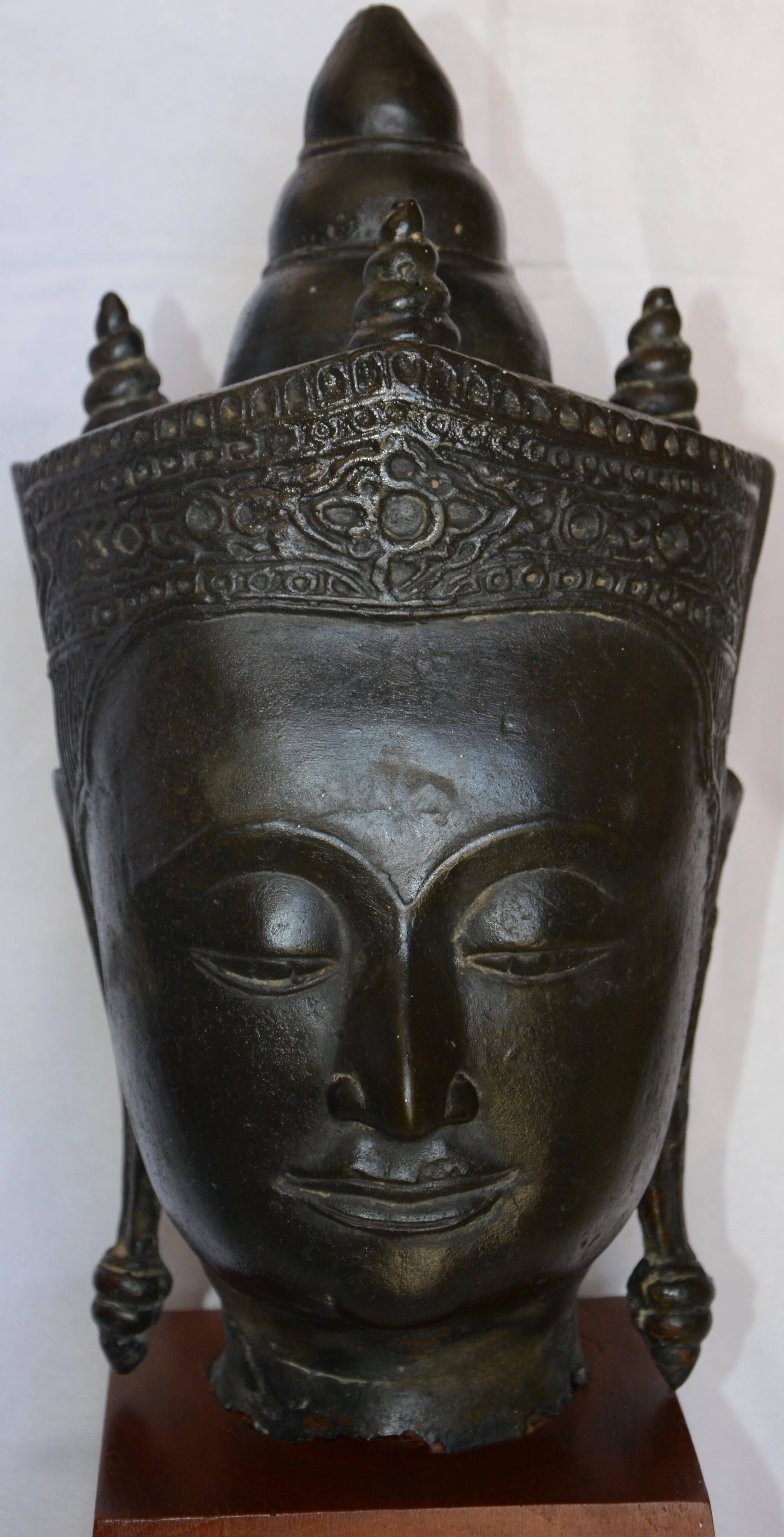 Tibetan Cast Bronze Bust of Buddha on Wooden Base, Late 18th Century For Sale