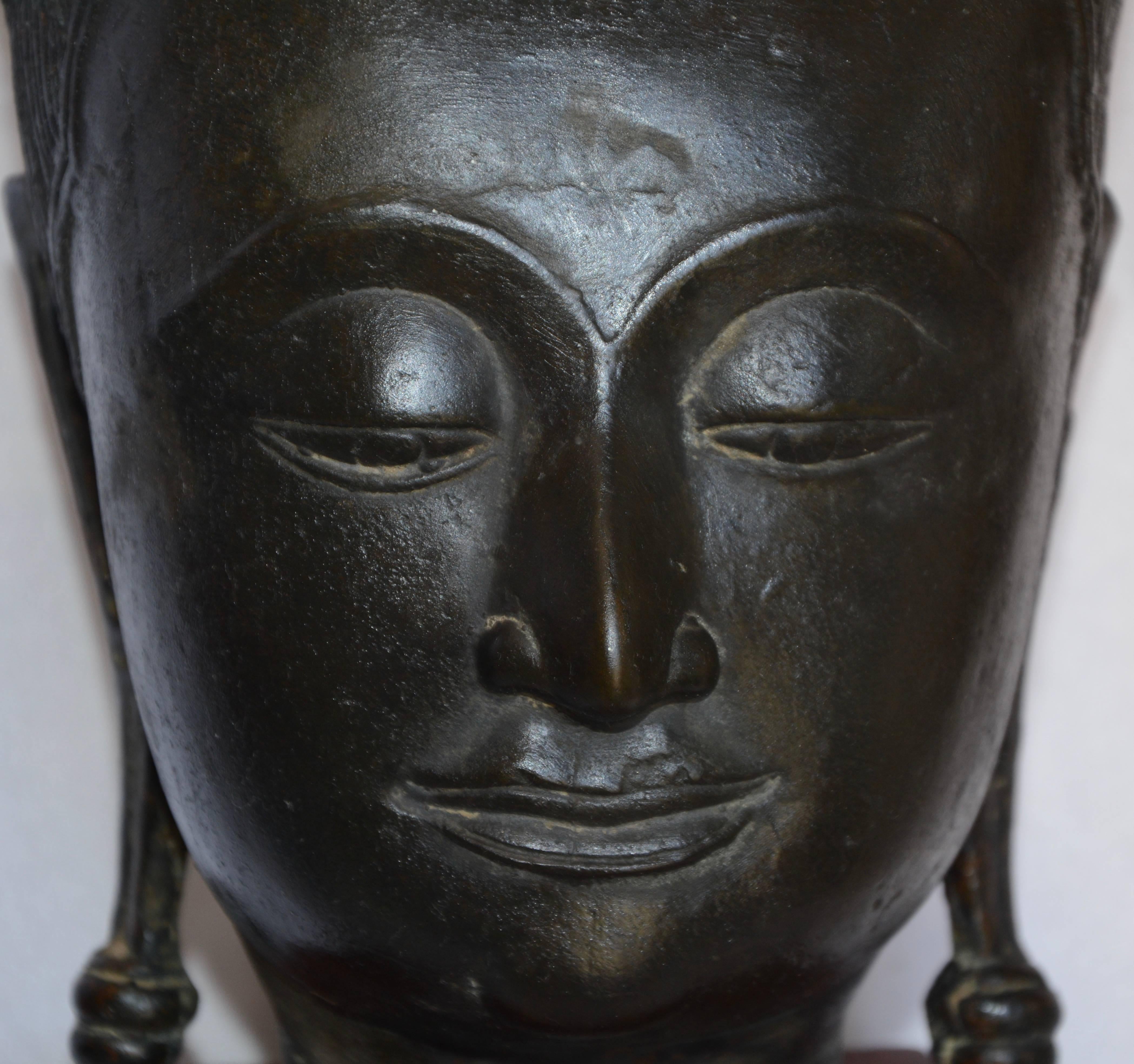 Hand-Carved Cast Bronze Bust of Buddha on Wooden Base, Late 18th Century For Sale