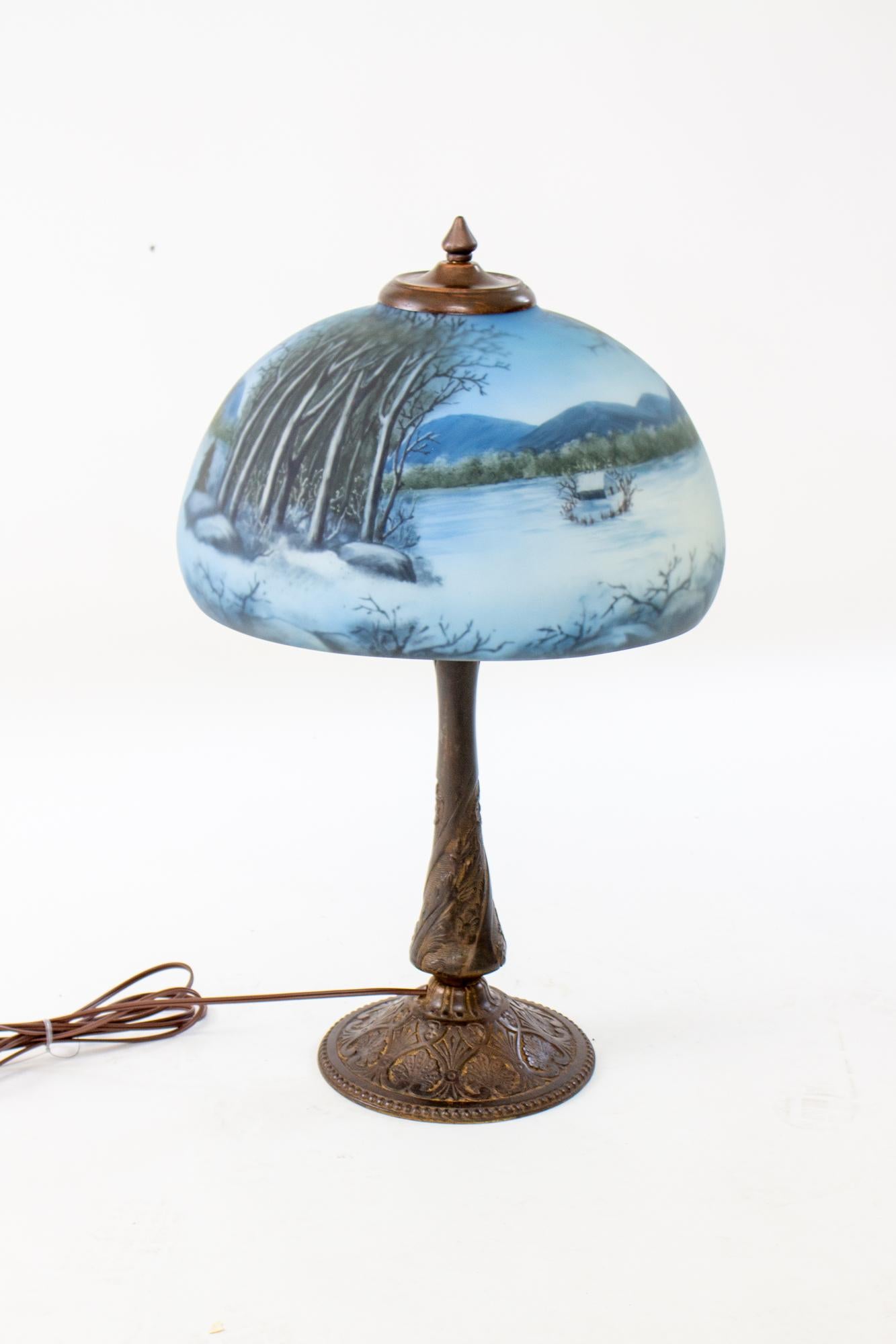 Hand-Painted Late 19th Century Cast Iron Table Lamp with Wintery Blue Reverse Painted Glass S For Sale