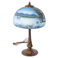 Late 19th Century Cast Iron Table Lamp with Wintery Blue Reverse Painted Glass S