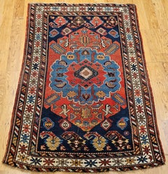 Late 19th Century Caucasian Kazak Area Rug in Red, Royal Blue, Ivory
