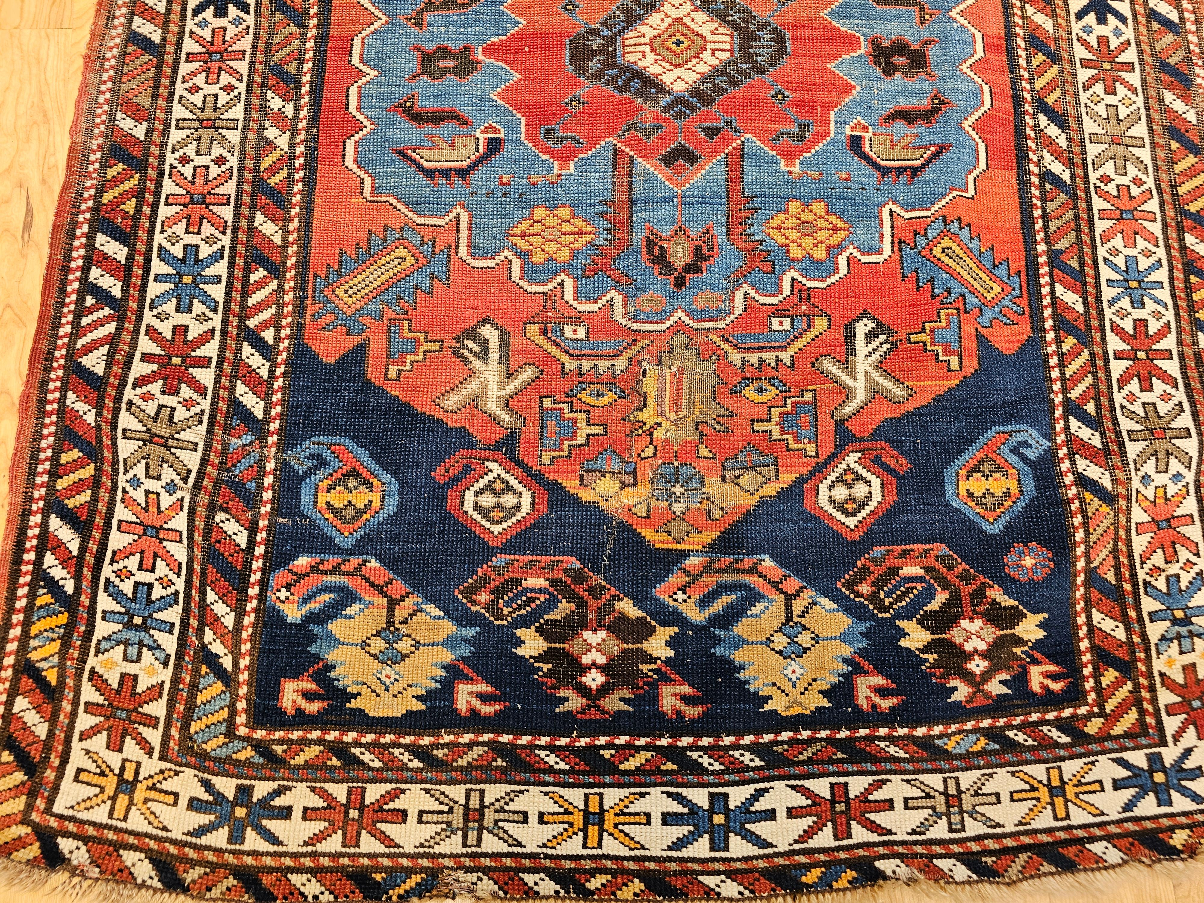 Alfombra kazaka de finales del siglo XIX en rojo, azul real y marfil Caucásico en venta