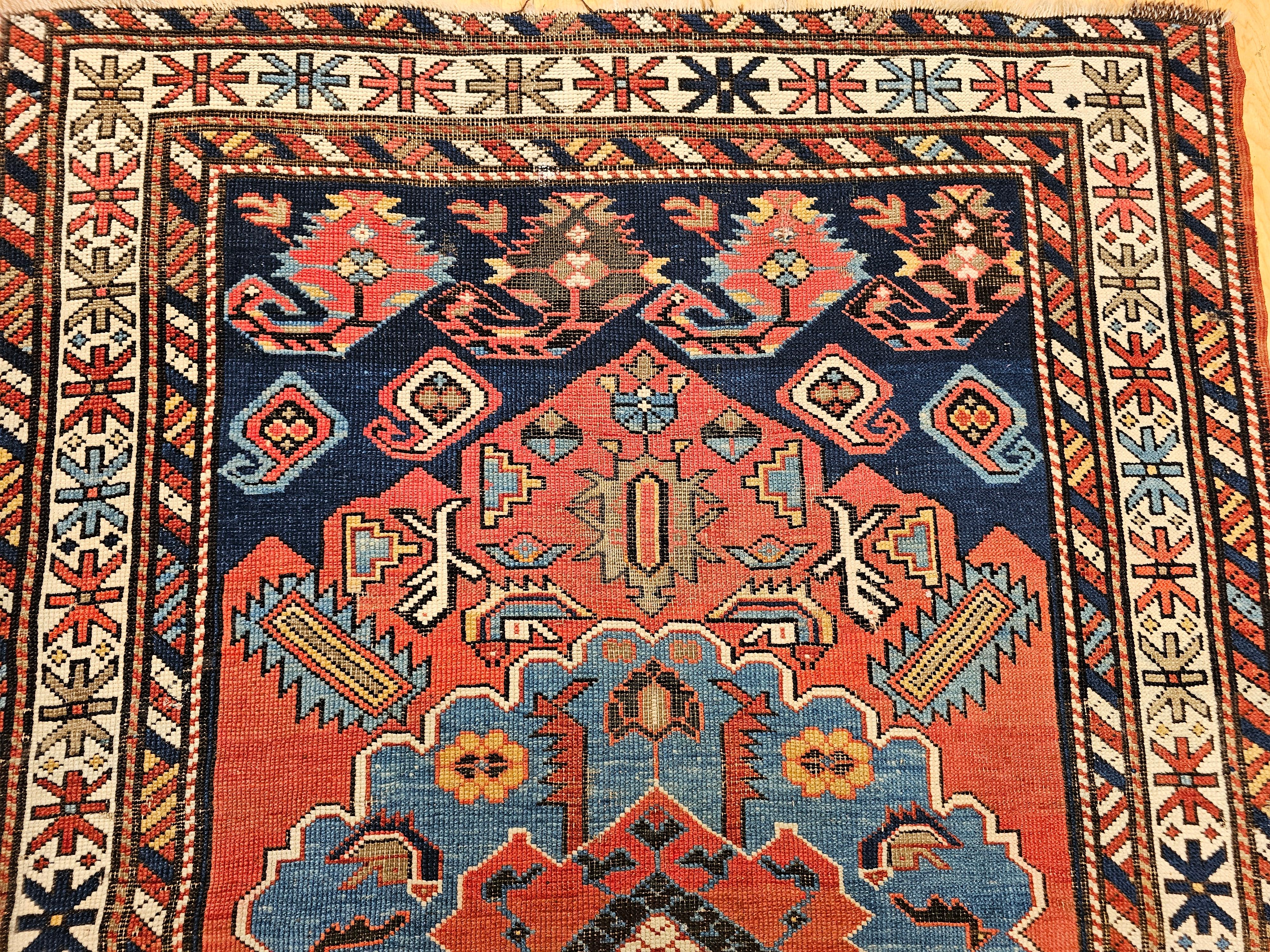 Alfombra kazaka de finales del siglo XIX en rojo, azul real y marfil en Bueno estado para la venta en Barrington, IL