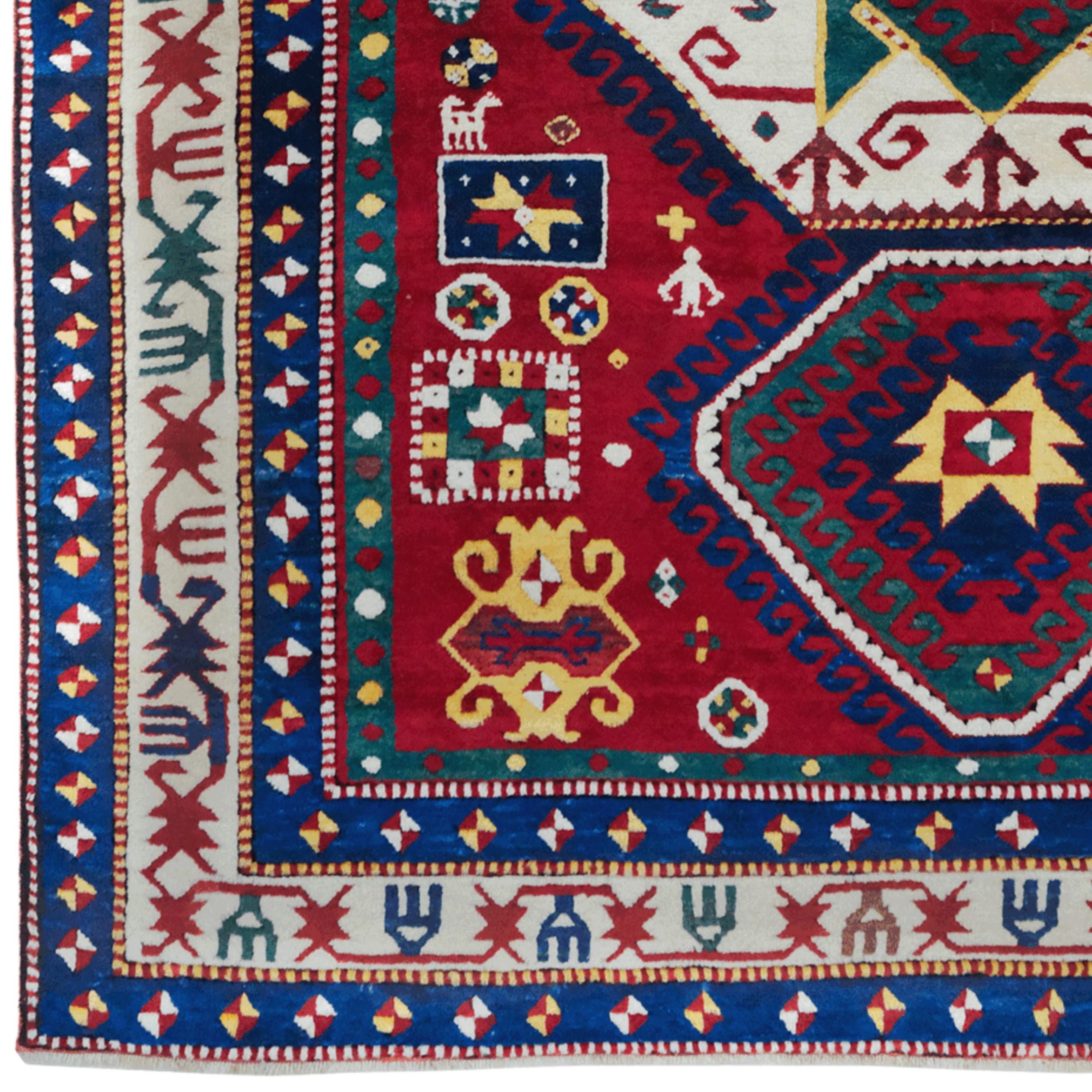 This magnificent rug is a rare Caucasian hand-woven piece dating from the late 19th century. Produced in the Lori Pambak region, this rug stands out with its unique pattern and color combination.

The striking star motif at the center of the rug is