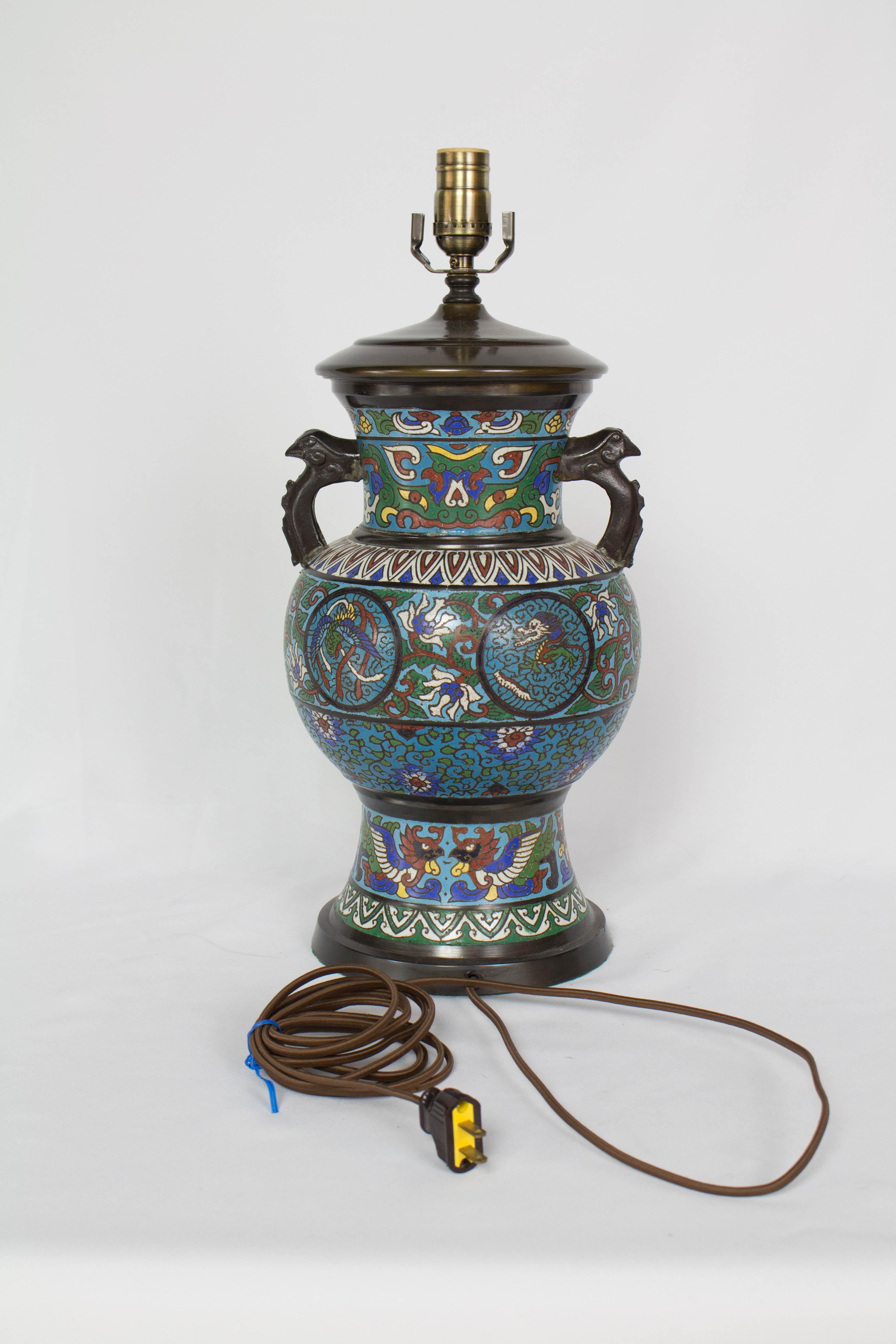 Champleve table lamp with Dragon Design, Two Handles. brightly saturated blue, red and green enamel in a bronze base.  