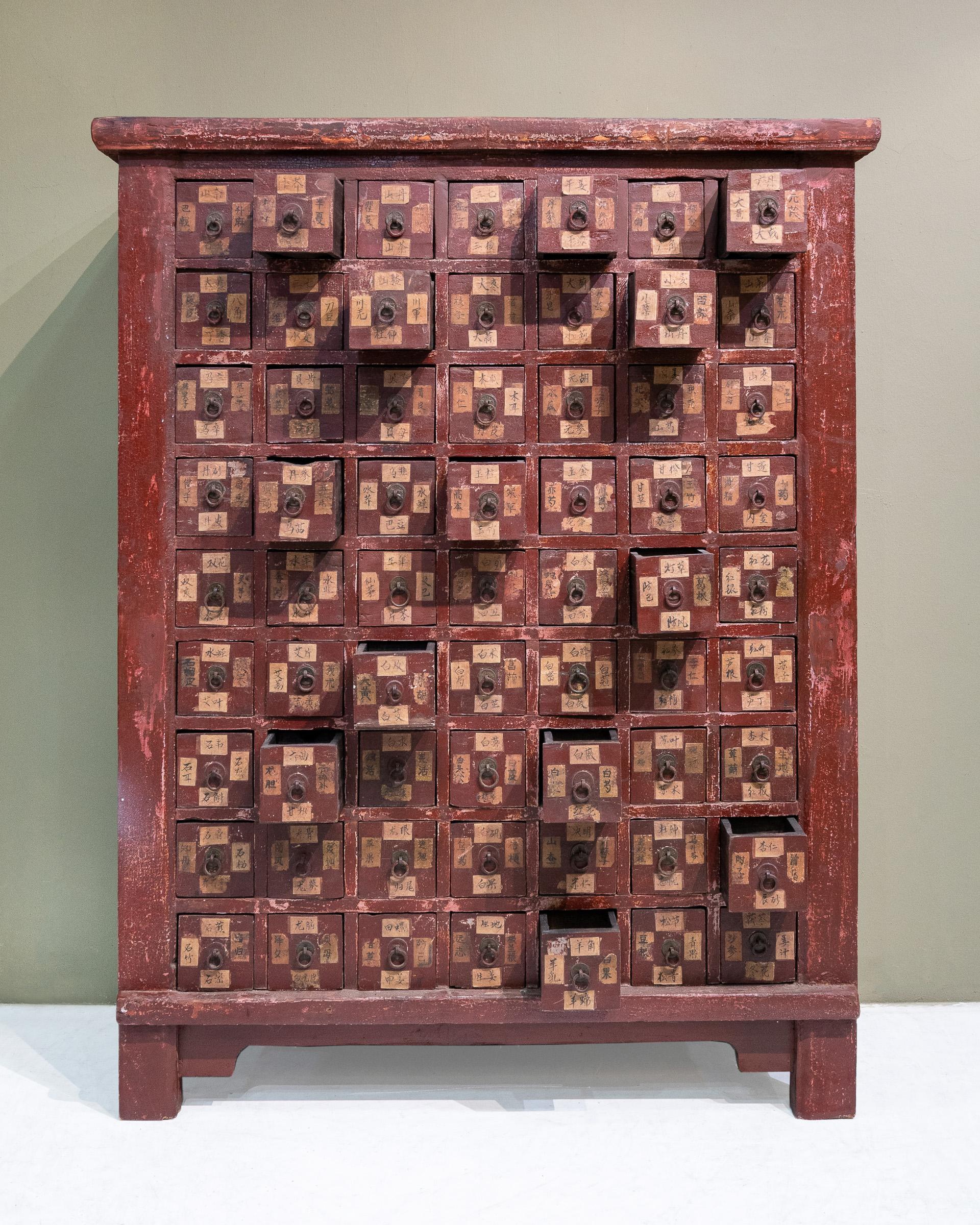 Late 19th century Chinese apothecary cabinet from Shanxi, China. These were used to store and organise Chinese herbs and the drawers were labeled according to the herbs that were stored inside. Many of the dividing panels inside the drawers were