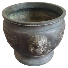 Late 19th Century Chinese Etched Brass Jardiniere with Lion Heads