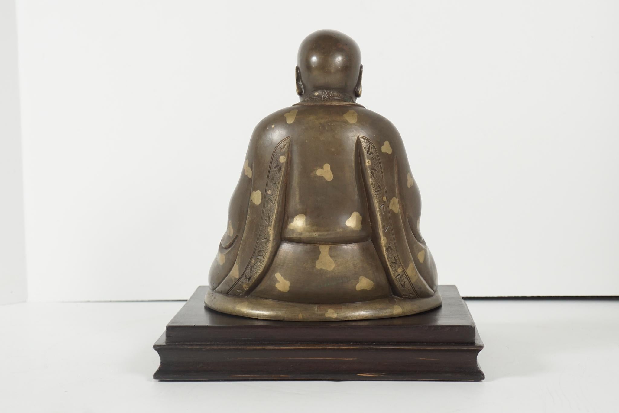 Late 19th Century Chinese Gold Fleck Cast Bronze Figure of Buddha In Good Condition For Sale In Hudson, NY