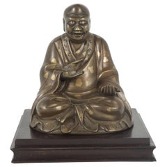 Late 19th Century Chinese Gold Fleck Cast Bronze Figure of Buddha