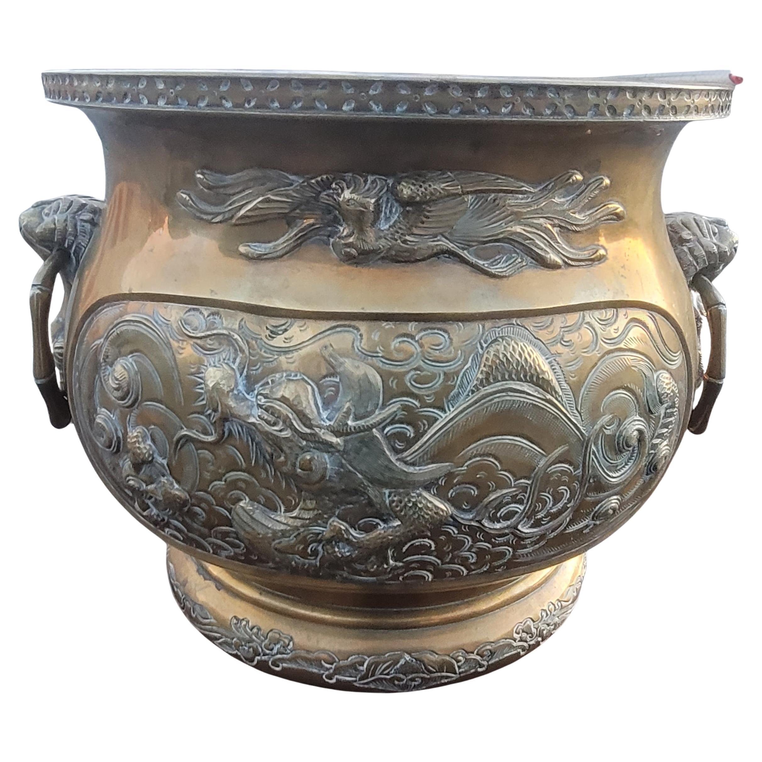 Late 19th century, Qing style Chinese hammered and engraved brass jardinière planter. Heavy duty and weigh about 10lbs. Measures 13