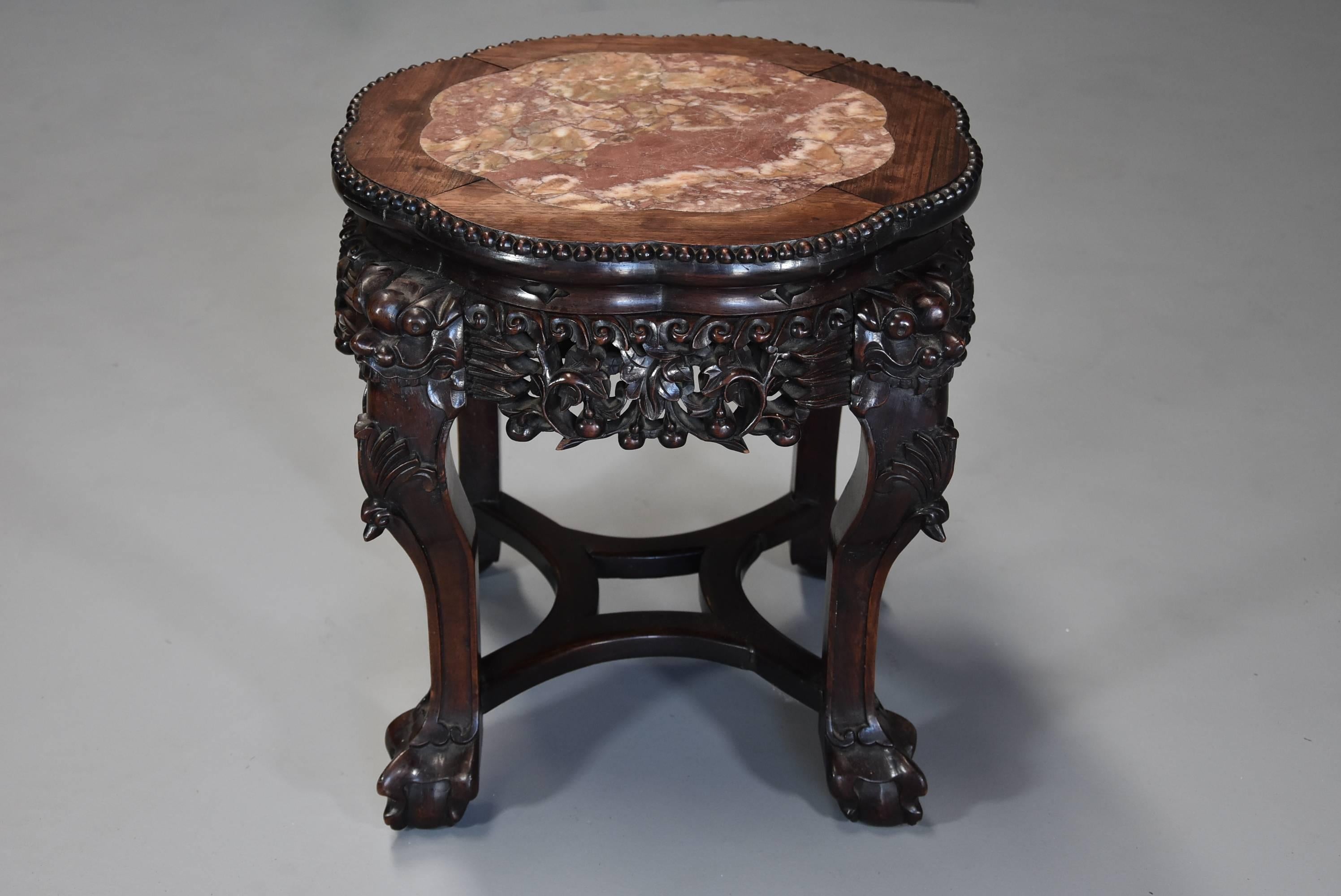 A late 19th century Chinese hardwood pot stand or low table with shaped marble inset top. 

This pot stand consists of a shaped Chinese rouge marble top recessed into a hardwood top with carved ball decoration to the edge.

This leads down to a