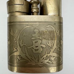 Late 19th century Chinese pipe enhanced with plant decorations