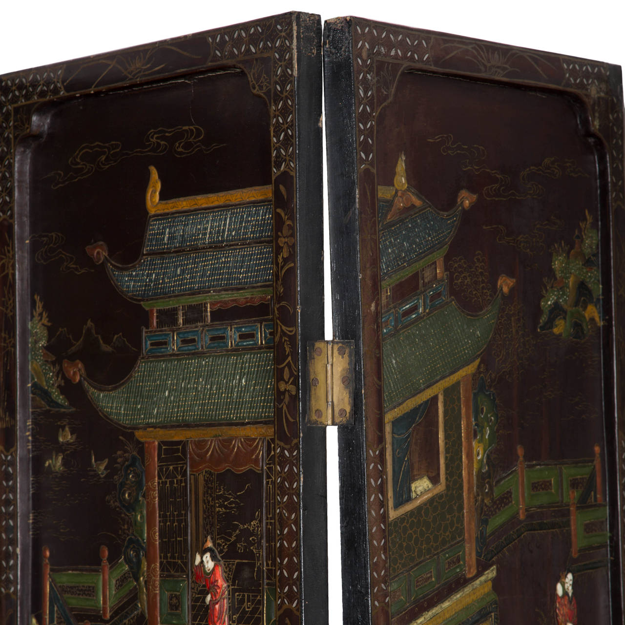 A superb quality late 19th century Chinese lacquered six-fold screen circa 1870-1900, with profuse raised and inlaid decoration.