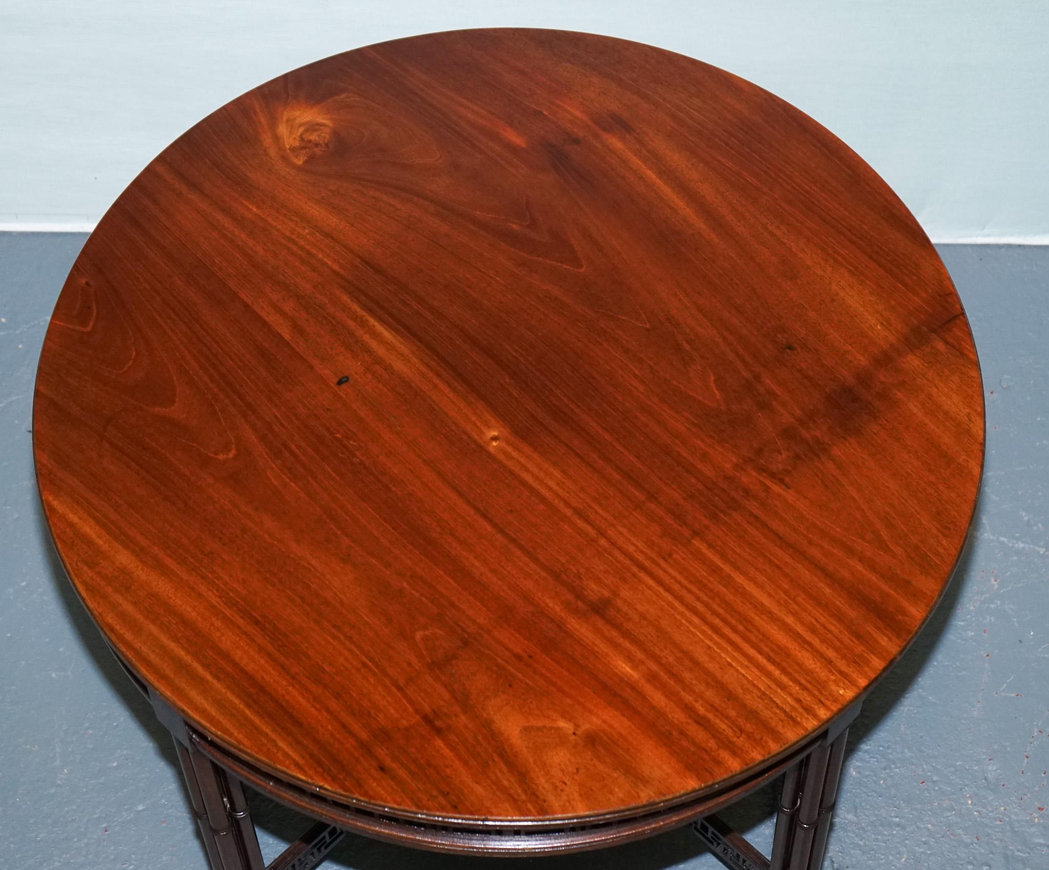 LATE 19TH CENTURY CHIPPENDALE STYLE ROUND OCCASiONAL TABLE AND CARVED STRETCHERS For Sale 3