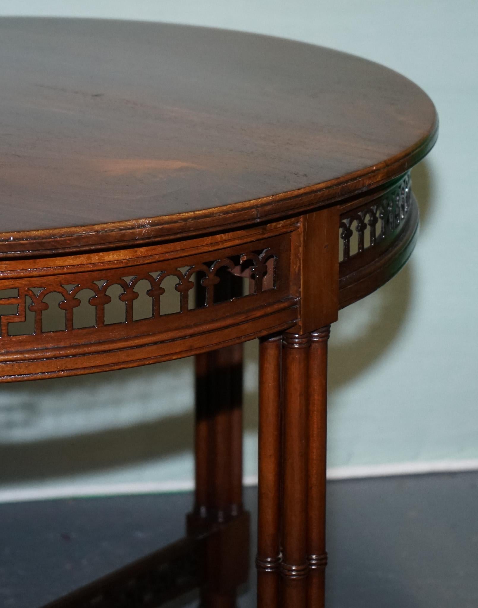 British LATE 19TH CENTURY CHIPPENDALE STYLE ROUND OCCASiONAL TABLE AND CARVED STRETCHERS For Sale