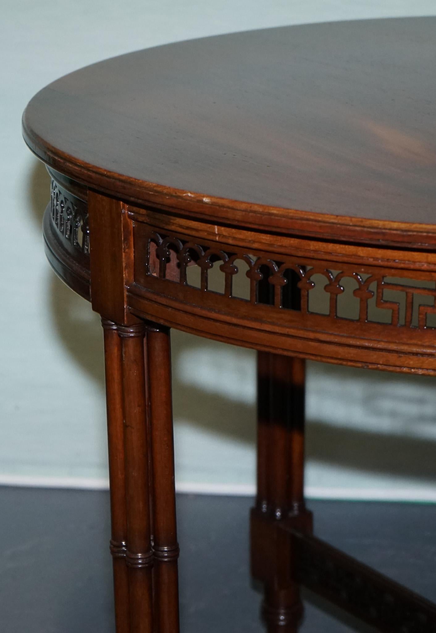 Hand-Crafted LATE 19TH CENTURY CHIPPENDALE STYLE ROUND OCCASiONAL TABLE AND CARVED STRETCHERS For Sale