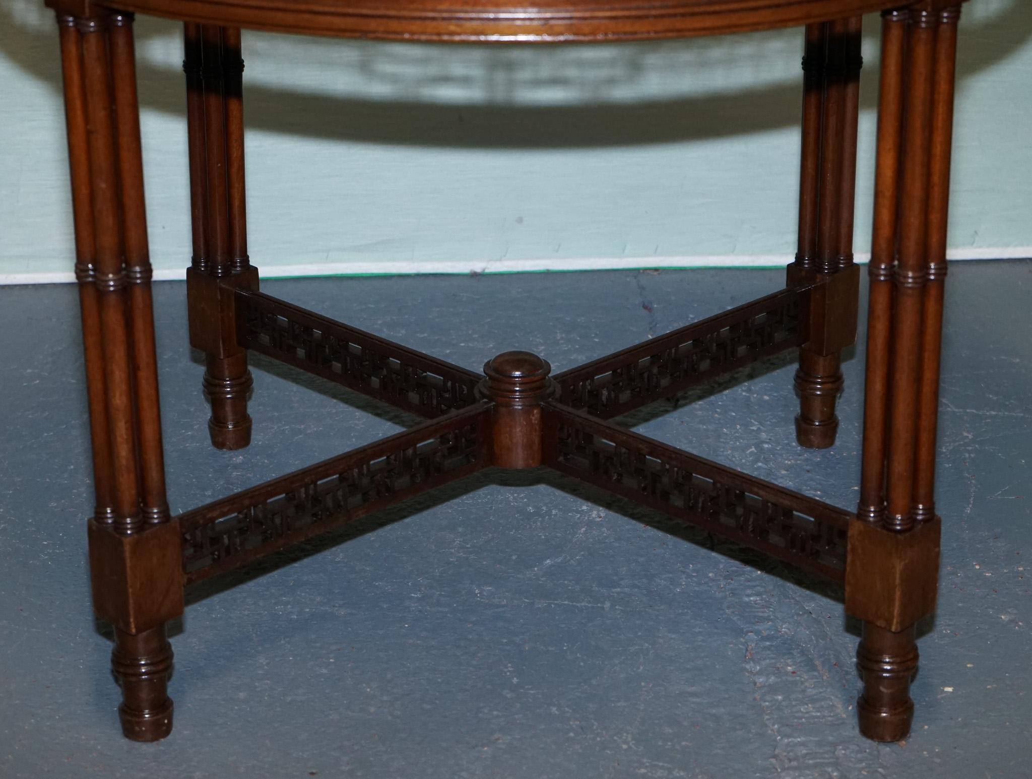 LATE 19TH CENTURY CHIPPENDALE STYLE ROUND OCCASiONAL TABLE AND CARVED STRETCHERS In Good Condition For Sale In Pulborough, GB