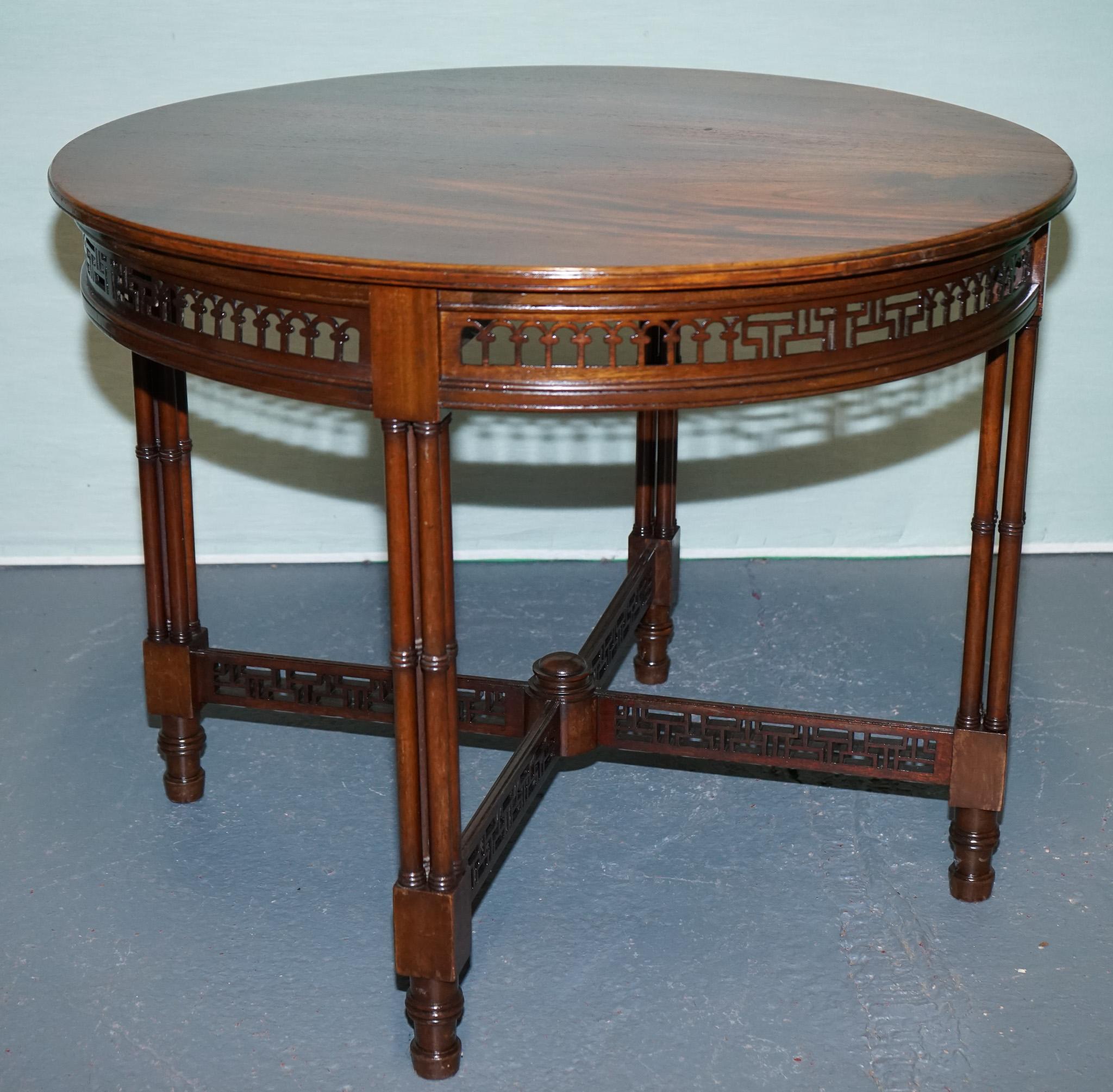 LATE 19TH CENTURY CHIPPENDALE STYLE ROUND OCCASiONAL TABLE AND CARVED STRETCHERS For Sale 1