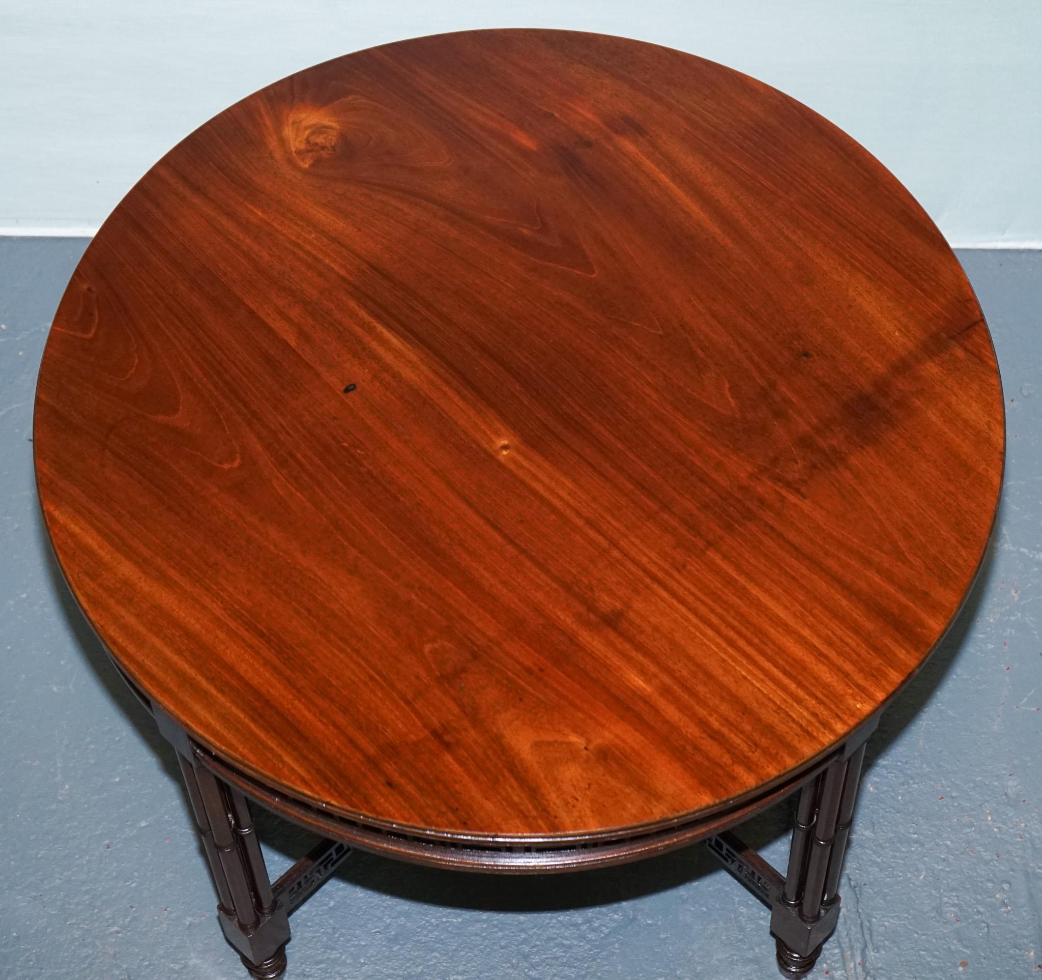 LATE 19TH CENTURY CHIPPENDALE STYLE ROUND OCCASiONAL TABLE AND CARVED STRETCHERS For Sale 2