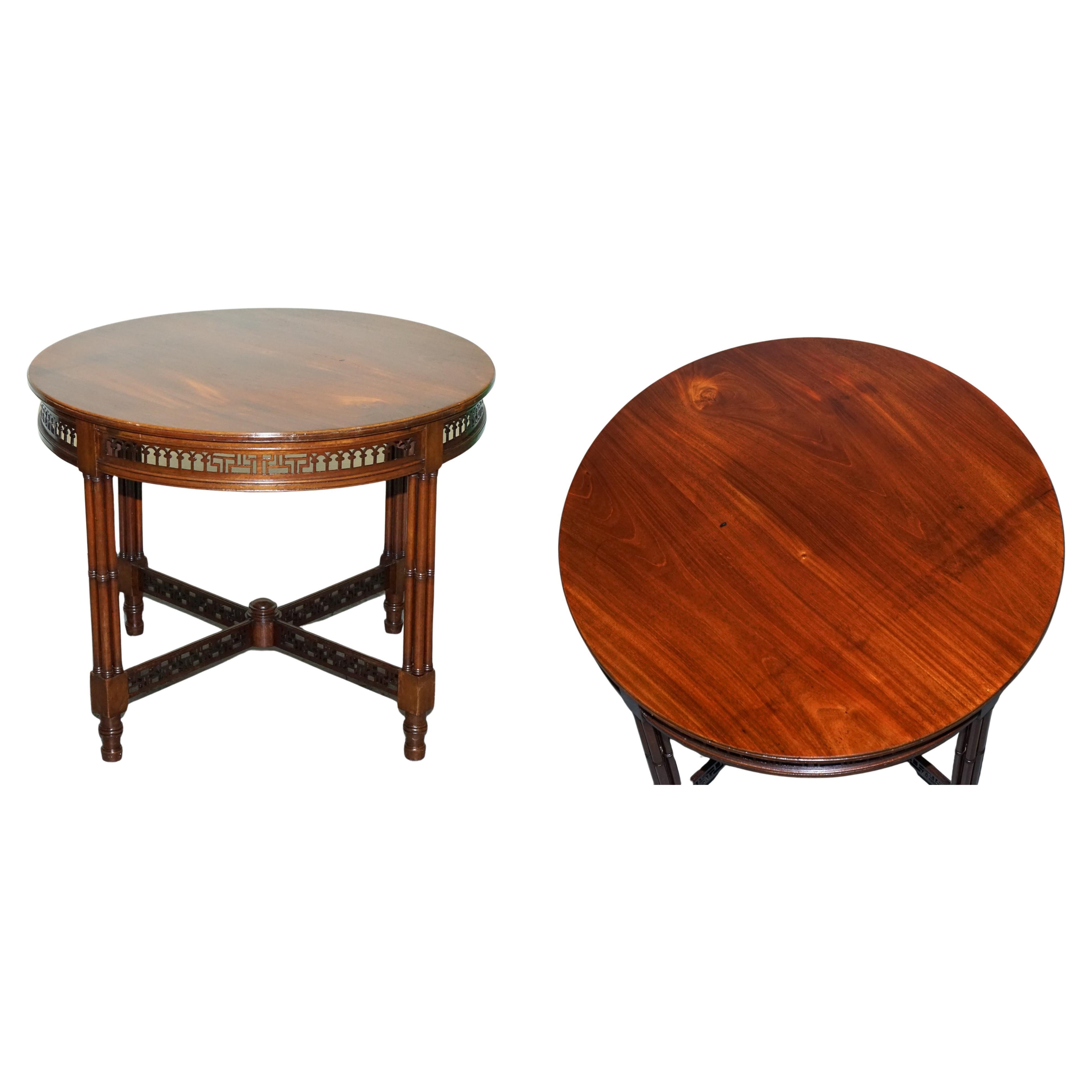 LATE 19TH CENTURY CHIPPENDALE STYLE ROUND OCCASiONAL TABLE AND CARVED STRETCHERS For Sale