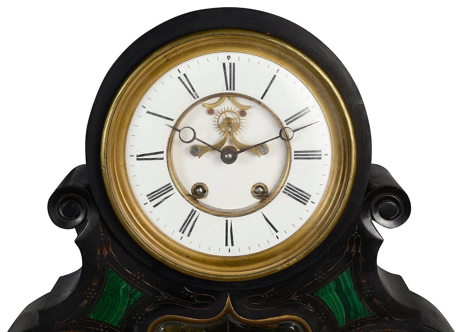 A very impressive late 19th Century Belgium black marble mantle clock, having white enamel dials to the eight day duration clock, with roman numerals, striking on the hour and half hour. Two further dials, one with a calendar and moon phase. The