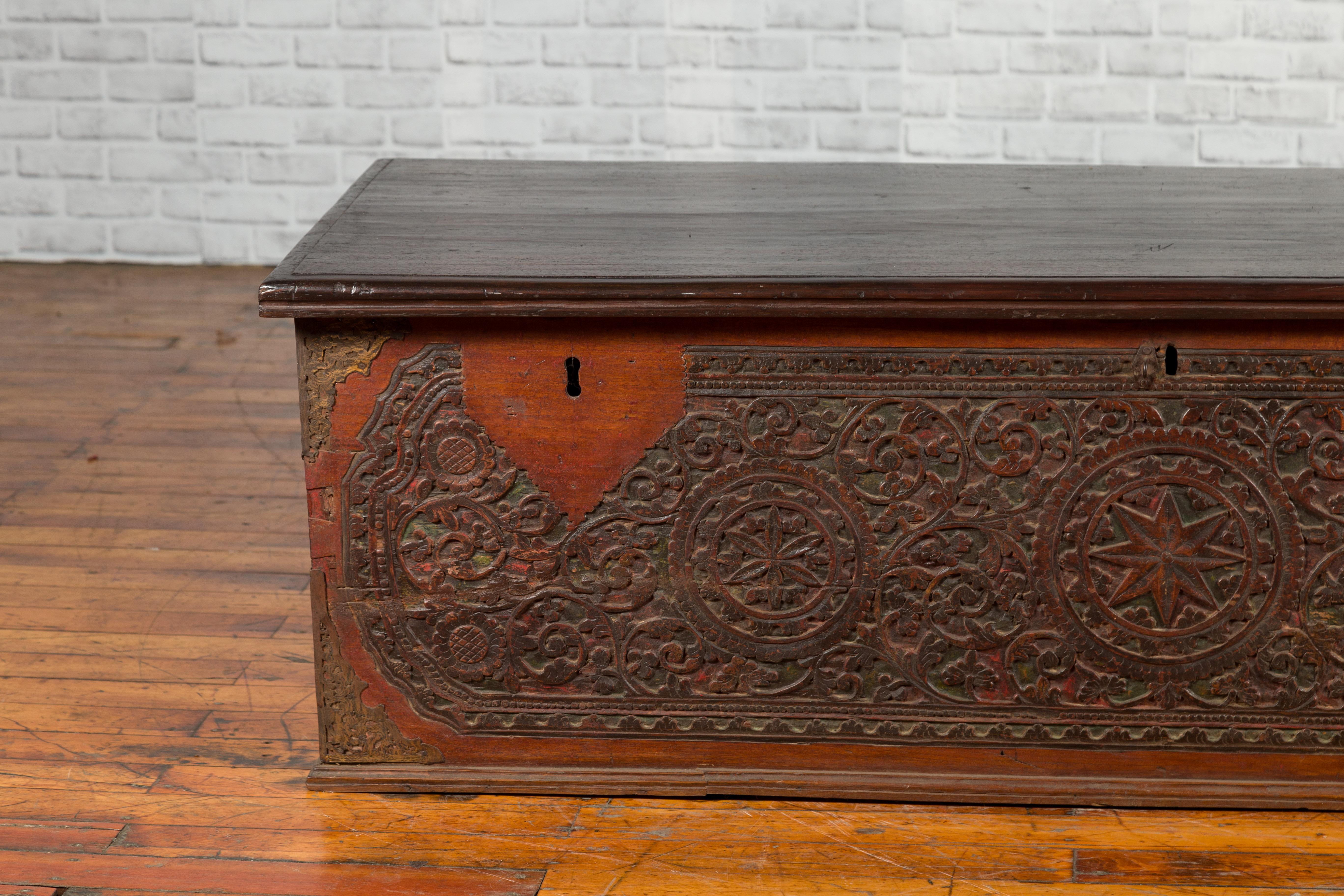 Late 19th Century Coffer from Sumatra with Carved Motifs and Iron Hardware In Good Condition For Sale In Yonkers, NY