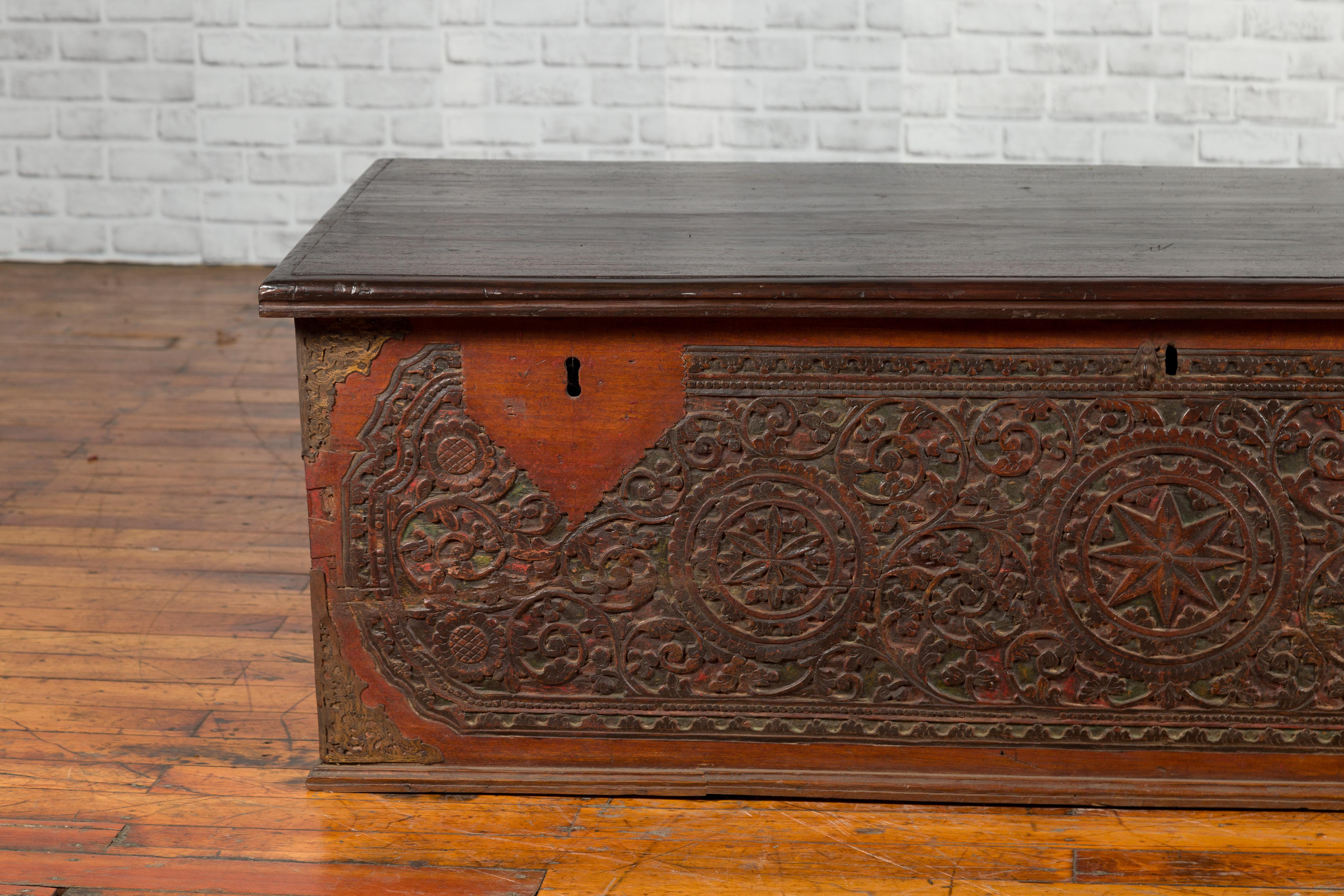 Late 19th Century Coffer from Sumatra with Carved Motifs and Iron Hardware In Good Condition For Sale In Yonkers, NY