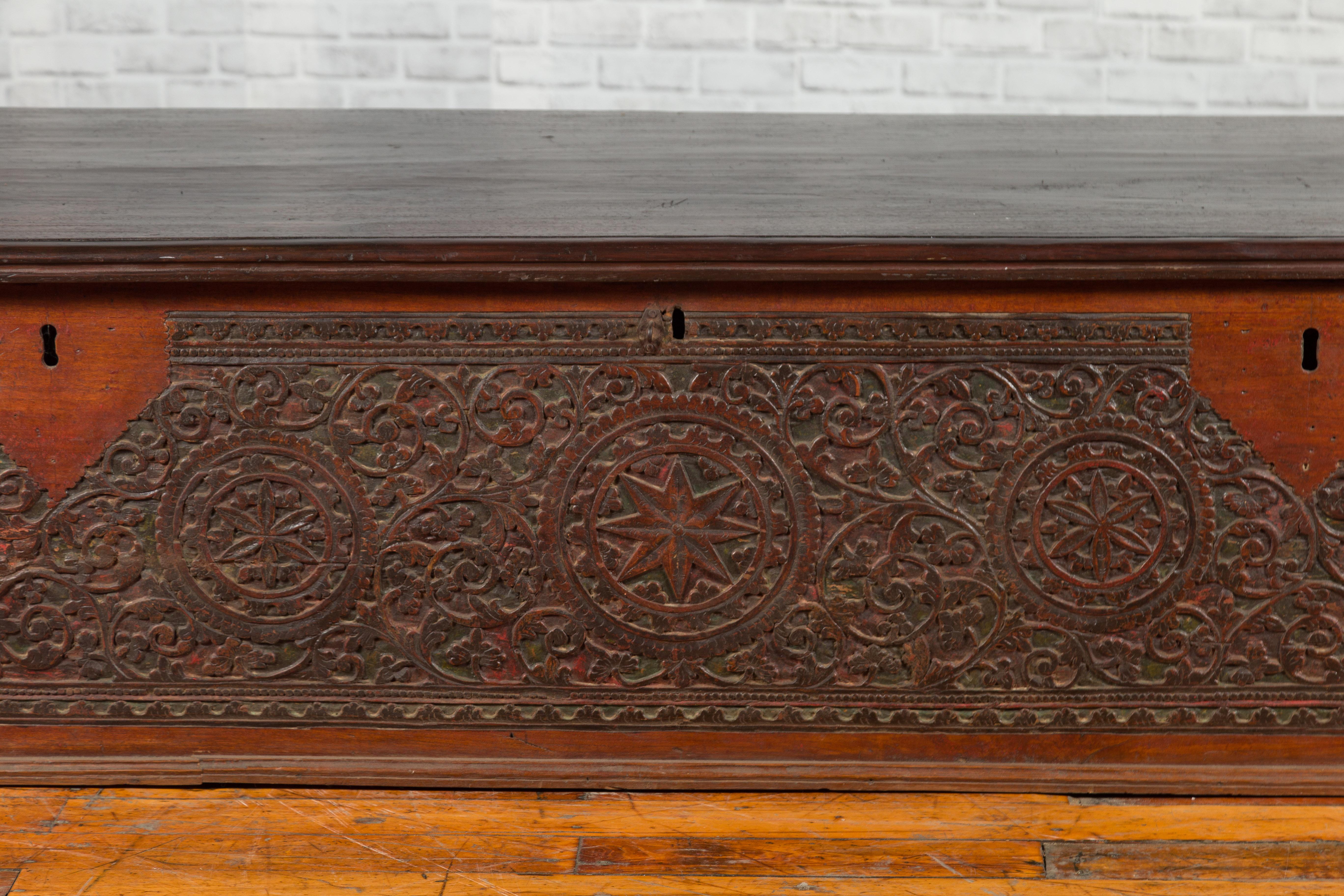 Wood Late 19th Century Coffer from Sumatra with Carved Motifs and Iron Hardware For Sale