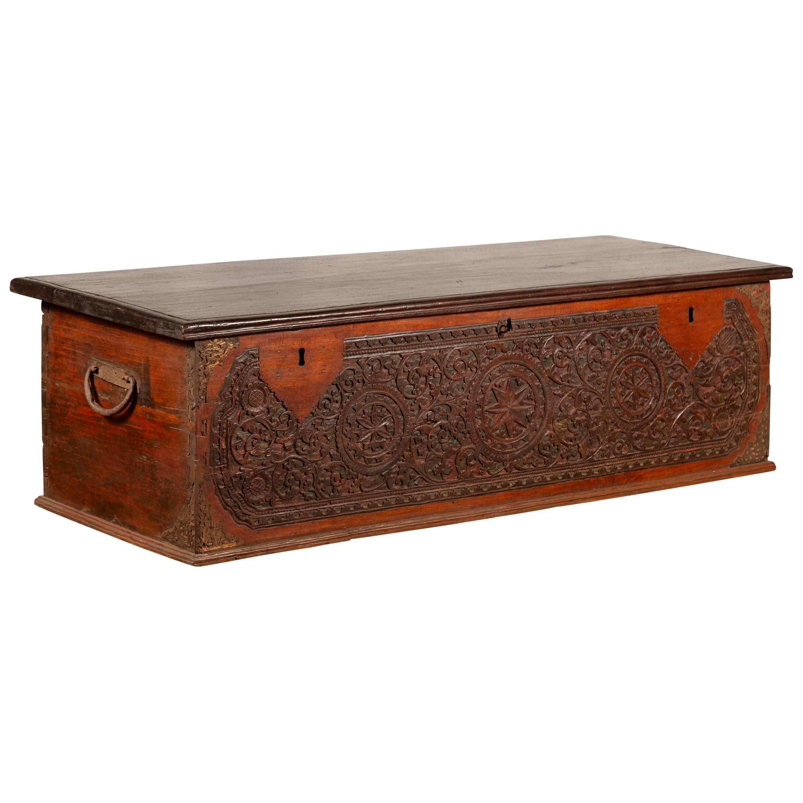 Late 19th Century Coffer from Sumatra with Carved Motifs and Iron Hardware For Sale
