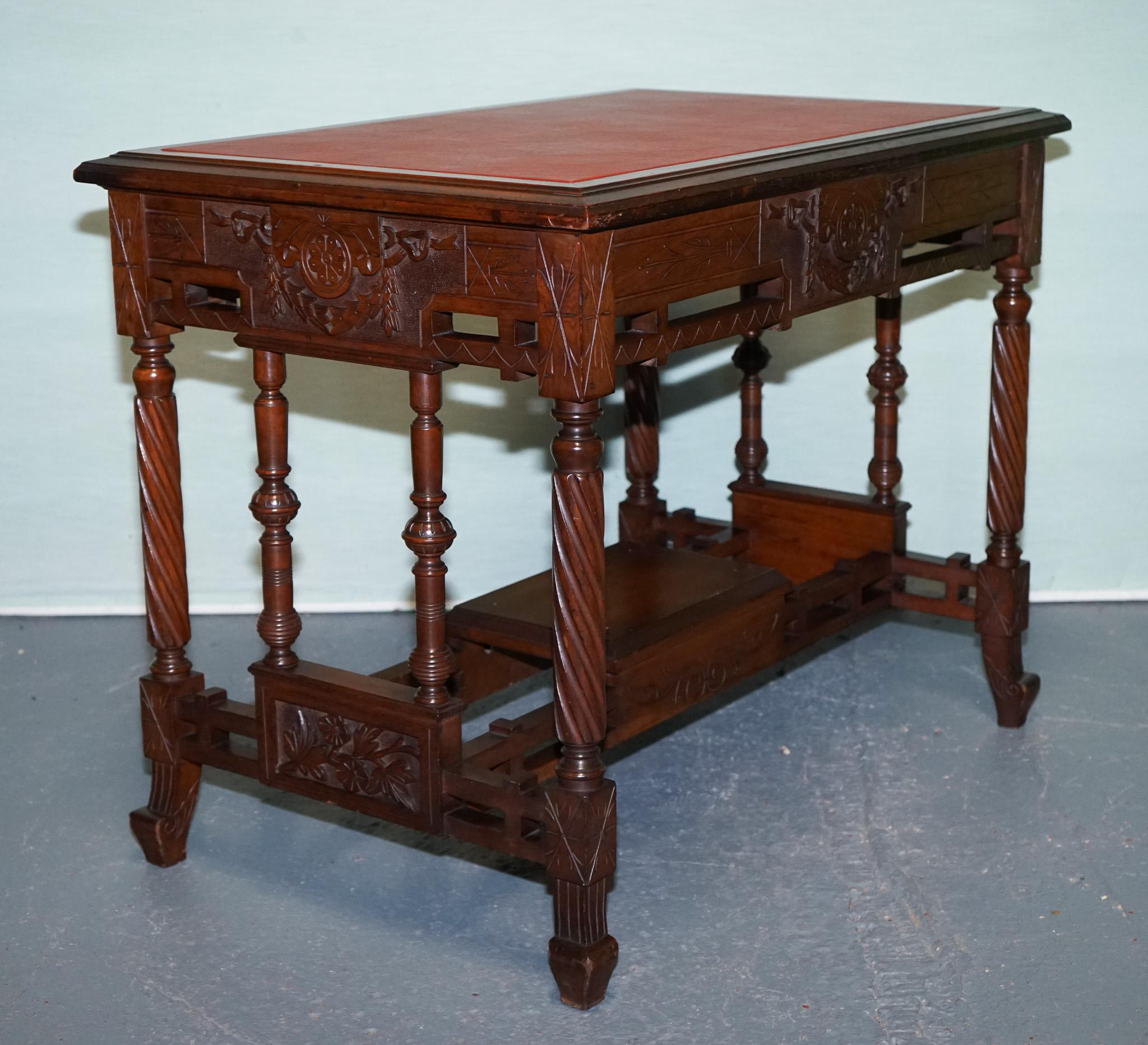 
Antiques of London



Elevate your interior with this exceptional late-19th-century English carved oak table, masterfully combining function and artistry. 

Originally designed as a writing or small game table, it features a beautifully aged red