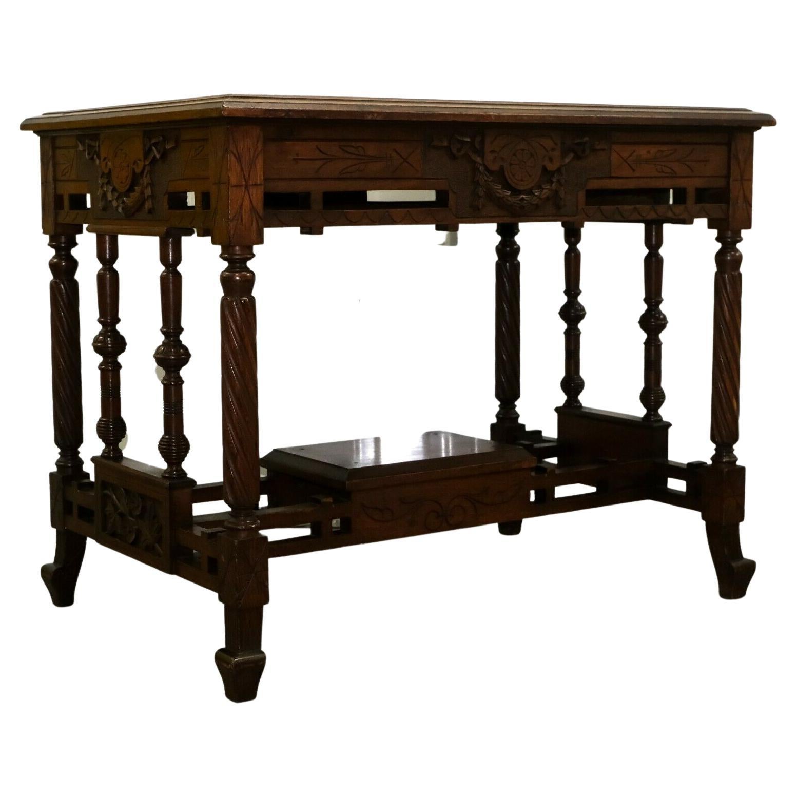 Late 19th Century Continental Carved Walnut Writing Table on Leather Inset Top For Sale
