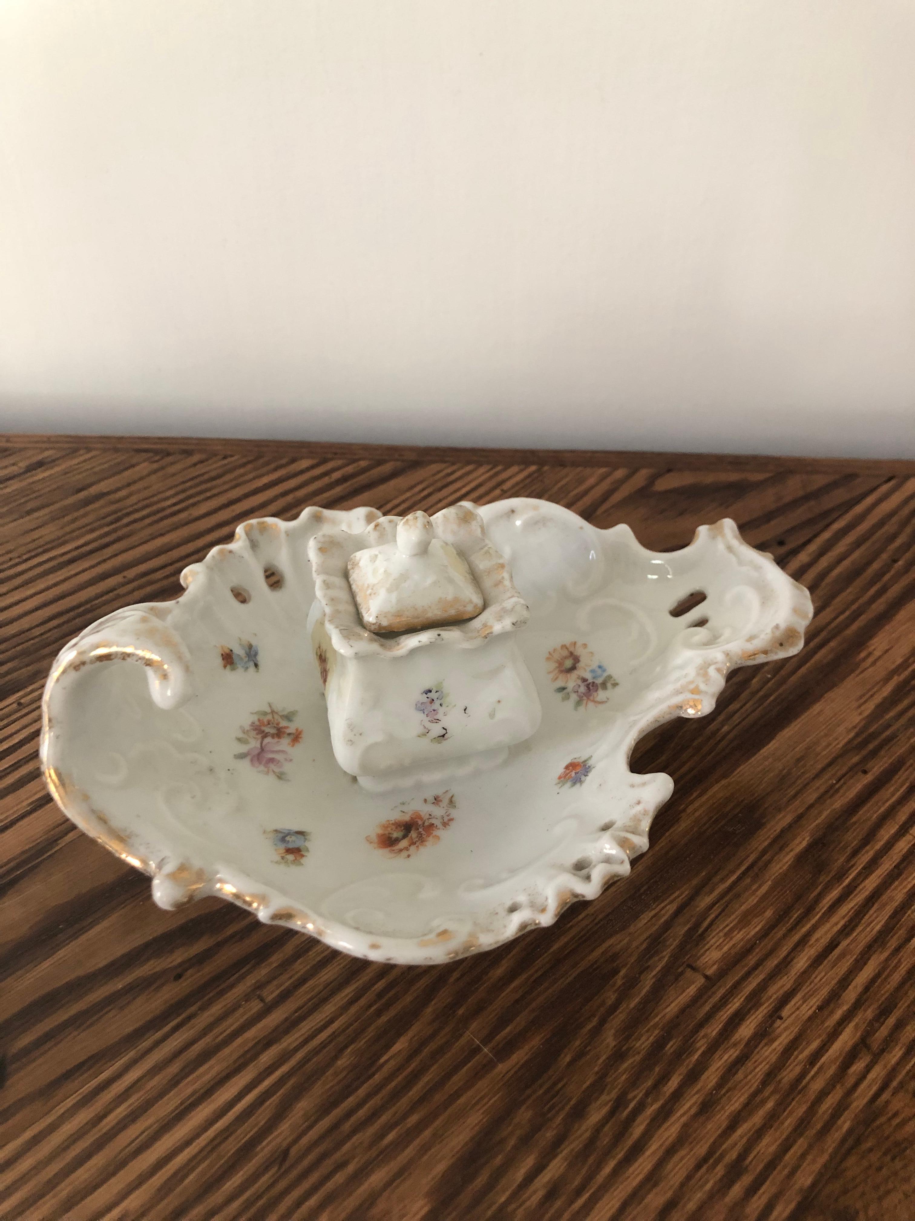 Late 19th century Continental porcelain inkwell with hand painted flowers on inkwell and stand.