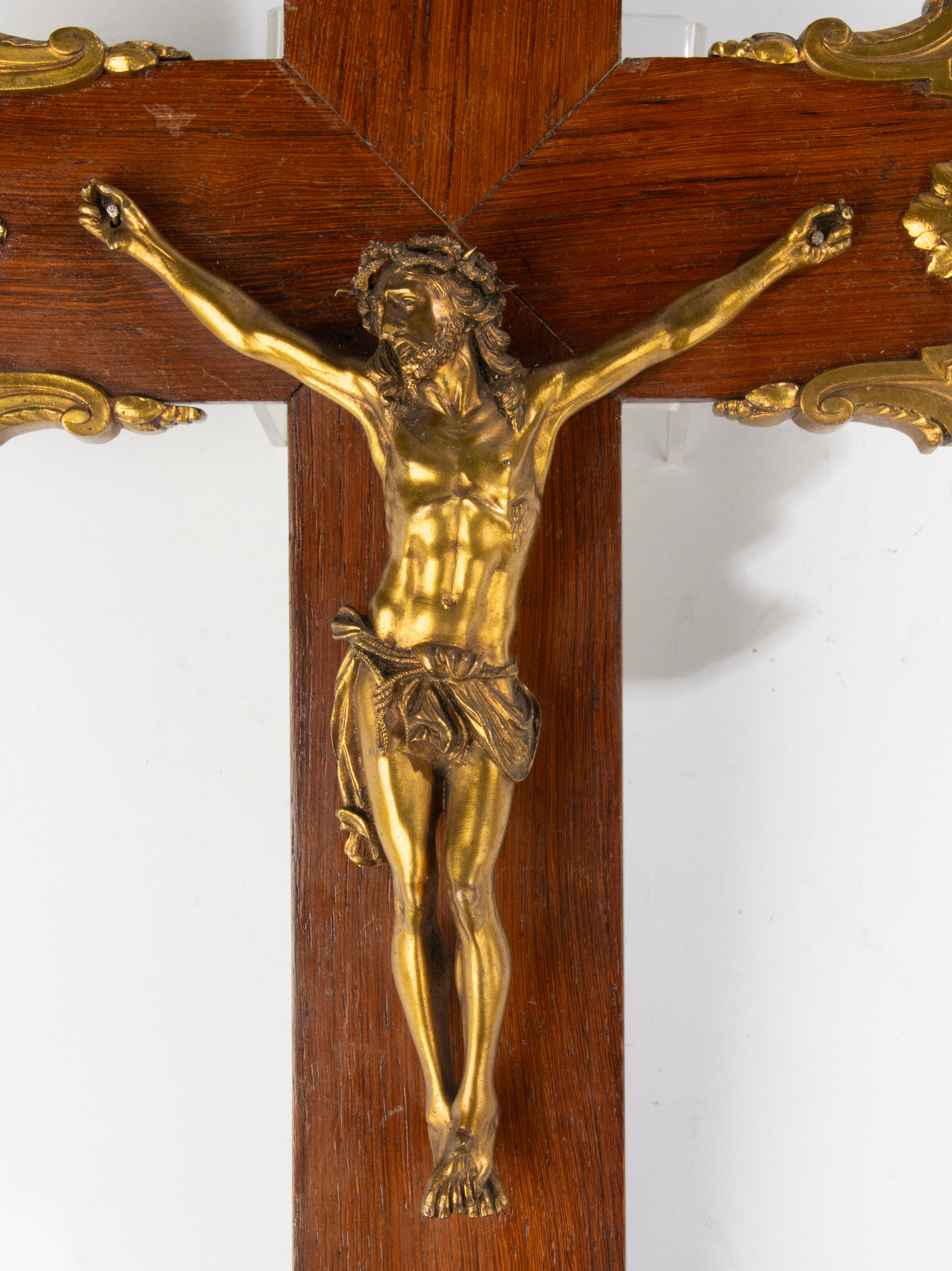 A beautiful antique crucifix, Jesus on the cross.
Estimated age and origin: France circa 1880-1890.
The cross is made of wood, with beautiful veneer work.
The Christ sculpture and the corner ornaments are made of ormolu gilded bronze. Very refined,