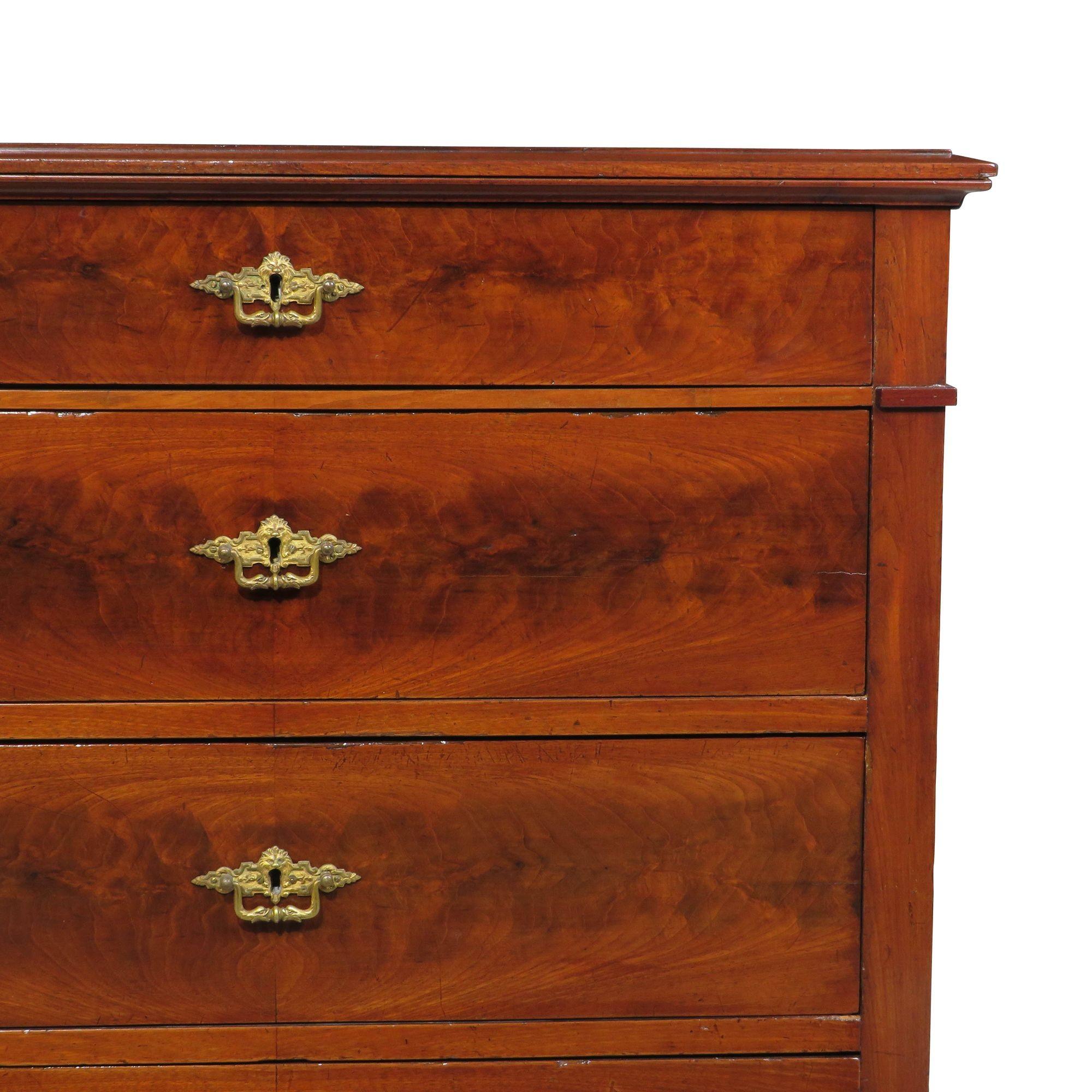 Cuban Mahogany Biedermeier dresser, 1880's, Denmark.
Handcrafted of cuban flame mahogany with four drawers, locking brass hardware, fine dovetail joinery, raised on plinth base.
 
The dresser has been lightly restored and polished. In a excellent